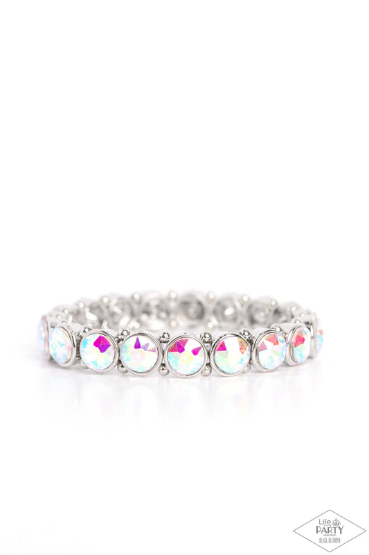 Paparazzi Accessories Sugar-Coated Sparkle - Multi Infused with dainty silver beads, glittery iridescent rhinestone-encrusted frames are threaded along stretchy bands around the wrist for a glamorous look. Sold as one individual bracelet. This Black Diamo