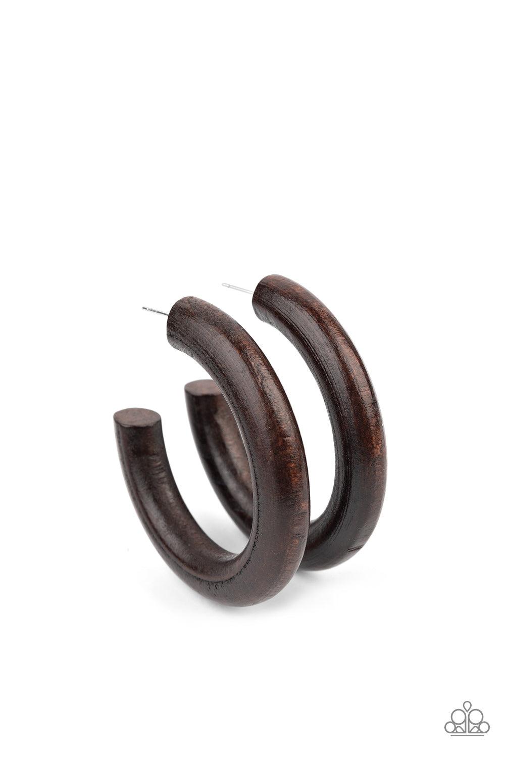 Paparazzi Accessories Woodsy Wonder - Brown Painted in a neutral brown finish, a thick wooden hoop curls around the ear for a flirtatiously earthy look. Earring attaches to a standard post fitting. Hoop measures approximately 2" in diameter. Sold as one p