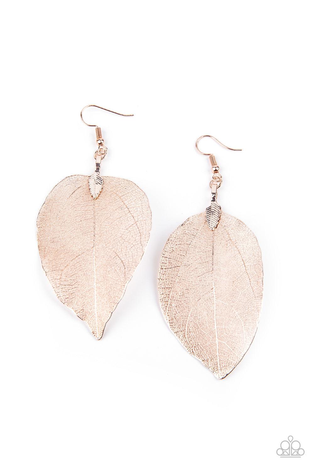 Paparazzi Accessories Leafy Legacy - Rose Gold Featuring lifelike details, a delicate rose gold frame branches out into a majestic leaf for a seasonal finish. Earring attaches to a standard fishhook fitting. Sold as one pair of earrings. Jewelry