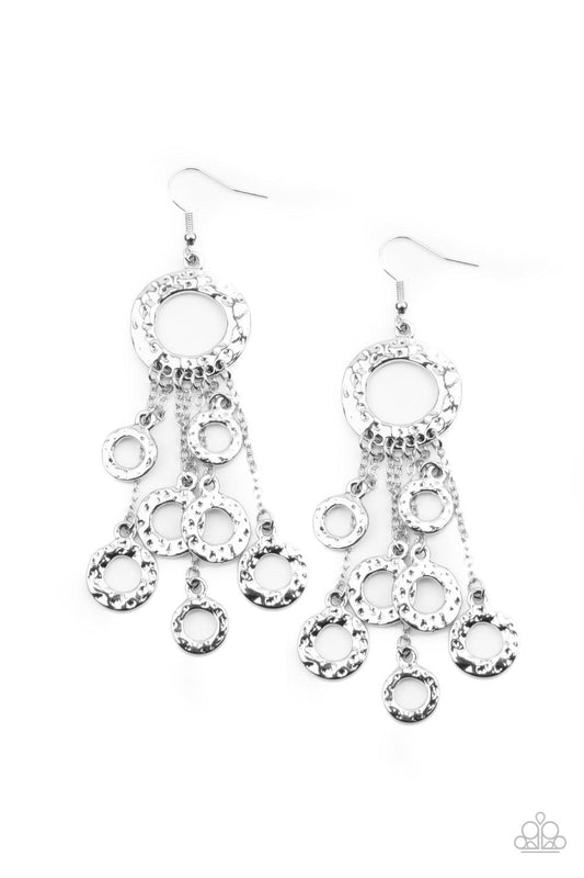Paparazzi Accessories Right Under Your NOISE - Silver Attached to dainty silver chains, a fringe of hammered silver rings swings from the bottom of a matching hammered ring for a noise-making statement. Earring attaches to a standard fishhook fitting. Sol