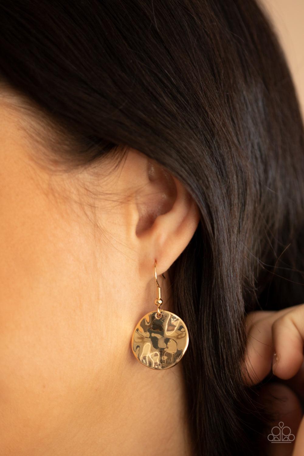 Paparazzi Accessories Learn The HARDWARE Way - Gold Glistening gold hoops link with a section of chunky gold chain below the collar. A shimmery collection of gold hoops and hammered gold and shiny copper discs cascade from the bottom of the golden display