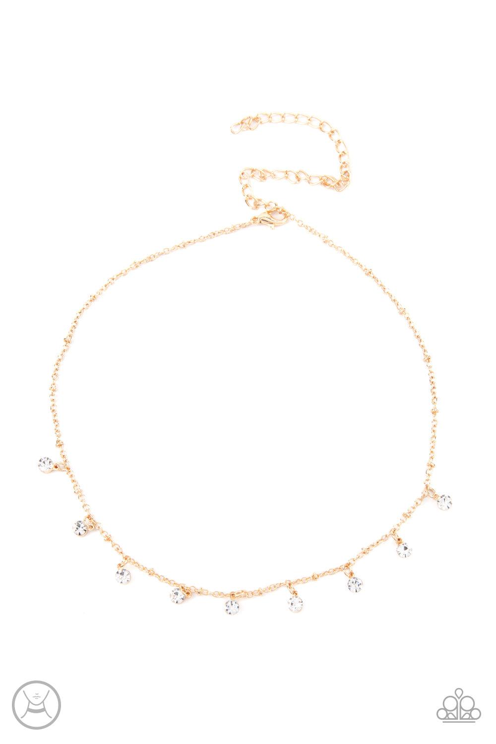 Paparazzi Accessories Dainty Diva - Gold Glassy white rhinestones swing from a dainty gold chain, creating a glamorous fringe around the neck. Features an adjustable clasp closure. Sold as one individual choker necklace. Includes one pair of matching earr