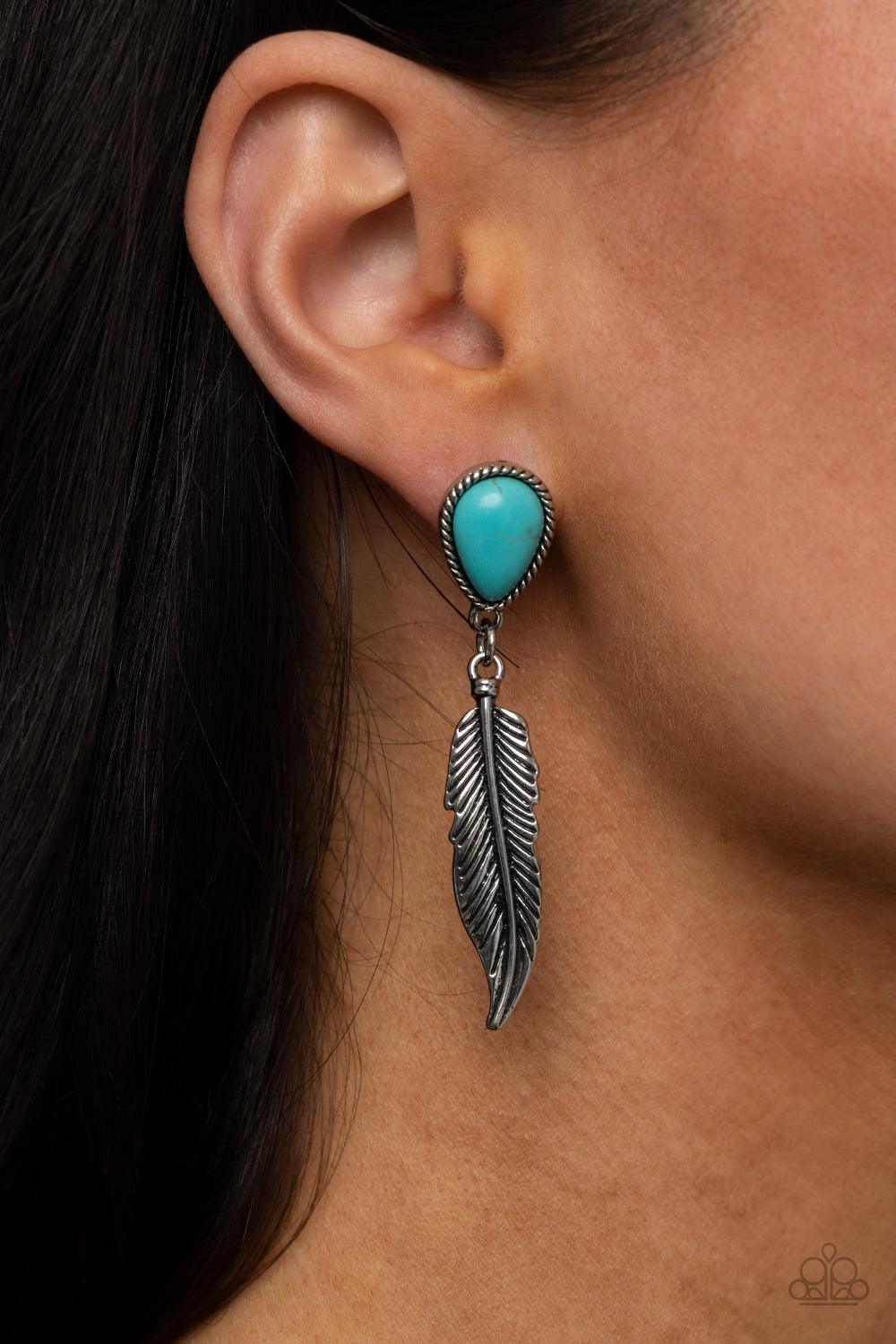 Paparazzi Accessories Totally Tran-QUILL - Blue A lifelike silver feather charm swings from the bottom of a teardrop turquoise stone teardrop, coalescing into a tranquil lure. Earring attaches to a standard post fitting. Sold as one pair of post earrings.
