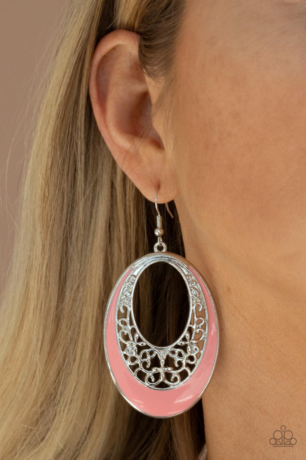 Paparazzi Accessories Orchard Bliss - Orange Featuring a refreshing Burnt Coral accent, airy vine-like filigree climbs the inside of a silver oval, creating a colorful display. Earring attaches to a standard fishhook fitting. Sold as one pair of earrings.