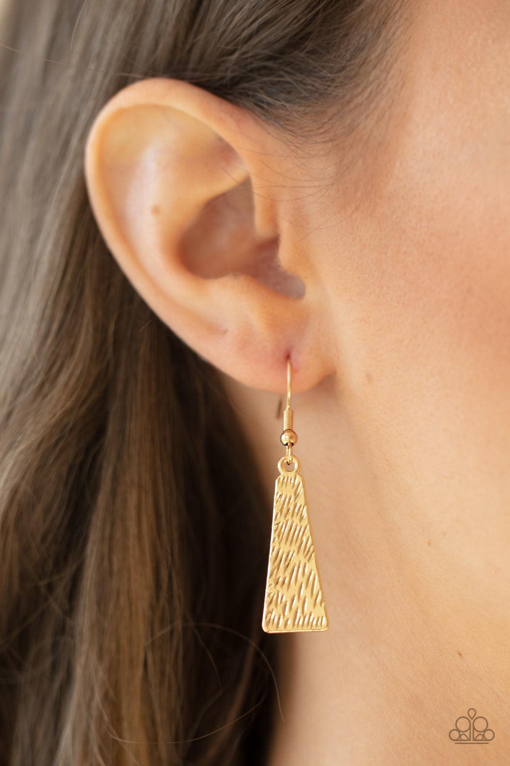 Paparazzi Accessories Happily Ever AFTERSHOCK - Gold Varying in hammered detail, a collision of rectangular gold frames connect into three shockingly shimmery plates below the collar for an intense industrial inspired look. Features an adjustable clasp cl
