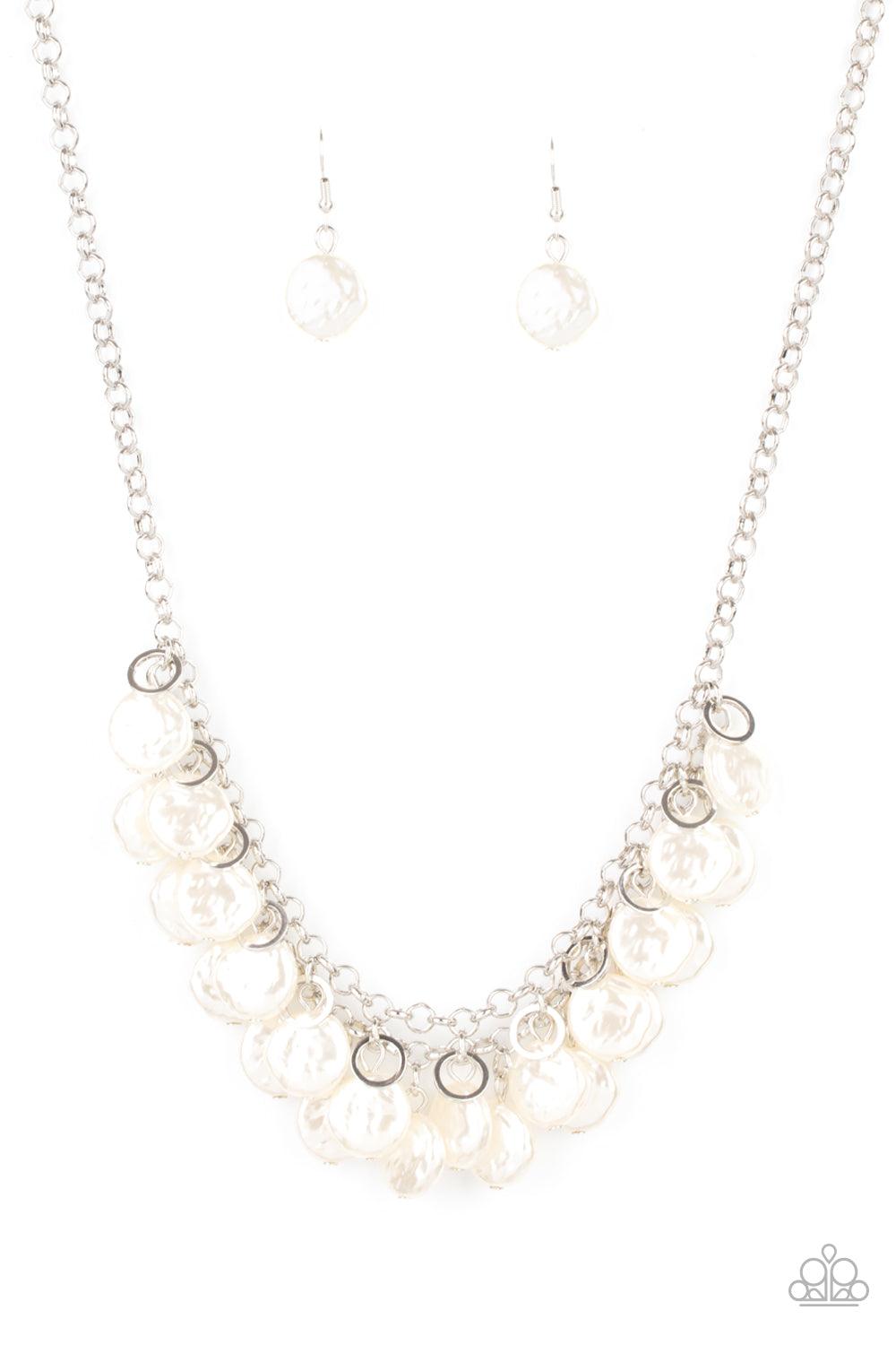 Paparazzi Accessories BEACHFRONT and Center - White Featuring delicately hammered surfaces, rows of pearly white beads cascade from the bottoms of interlocking silver chains. Dainty silver rings swing from the top of the timelessly tiered display, creatin
