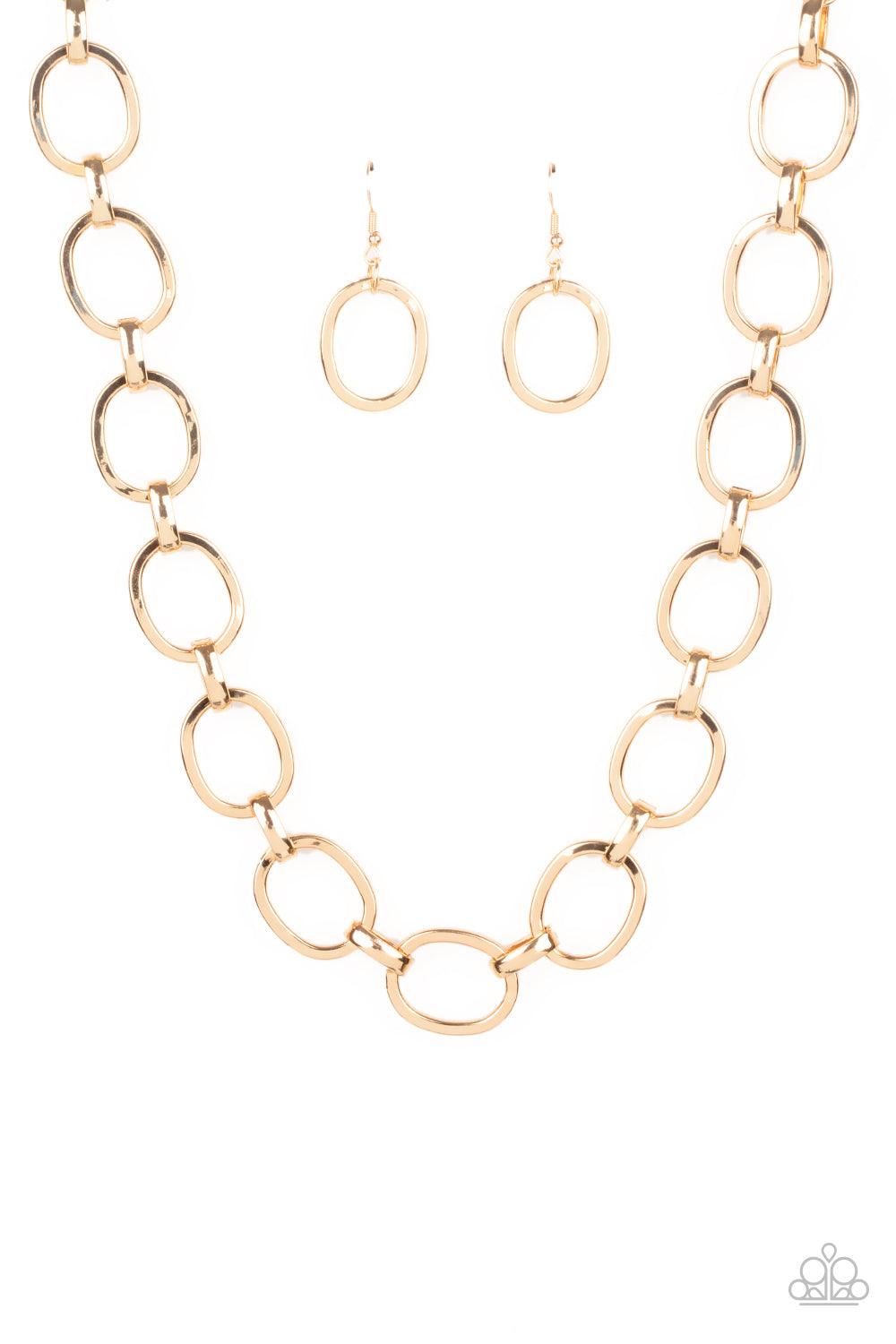 Paparazzi Accessories HAUTE-ly Contested - Gold A glistening series of dramatically oversized ovals and links boldly connect below the collar, creating an intense industrial statement. Features an adjustable clasp closure. Sold as one individual necklace.