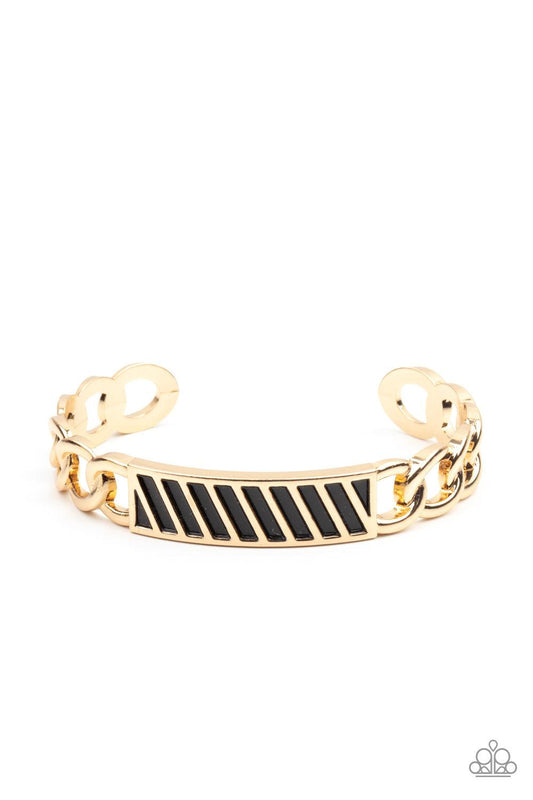 Paparazzi Accessories Keep Your Guard Up - Gold Gold chain-like bars attach to a riveted gold centerpiece, creating a statement-making cuff around the wrist. Sold as one individual bracelet. Jewelry