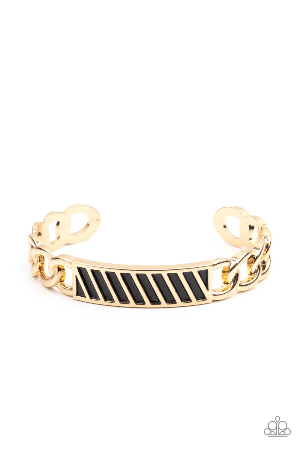 Paparazzi Accessories Keep Your Guard Up - Gold Gold chain-like bars attach to a riveted gold centerpiece, creating a statement-making cuff around the wrist. Sold as one individual bracelet. Jewelry