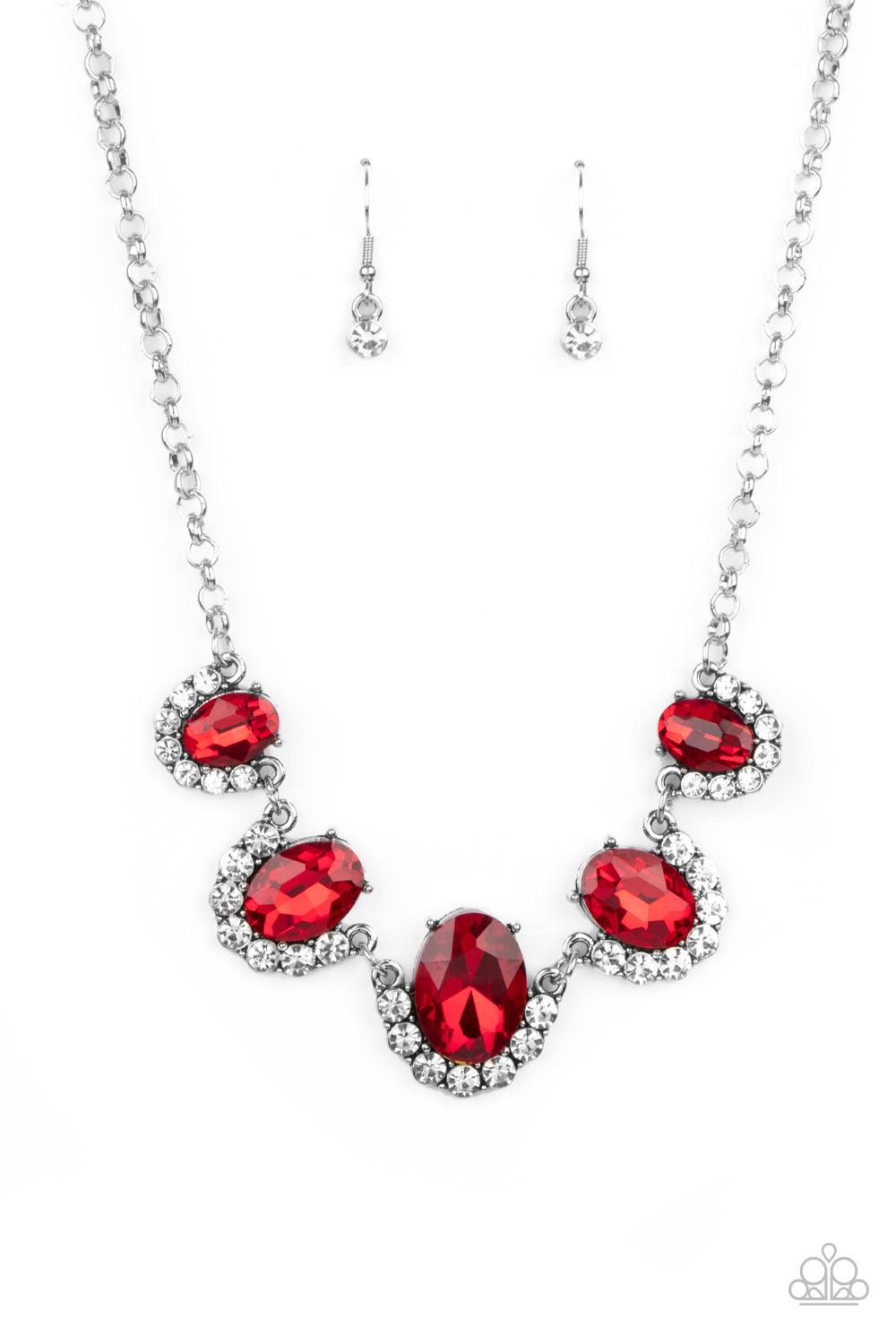Paparazzi Accessories The Queen Demands It - Red Gradually increasing in size at the center, the sparkly bottoms of oversized red gems are bordered in rows of glassy white rhinestones as they link below the collar for a dramatic effect. Features an adjust