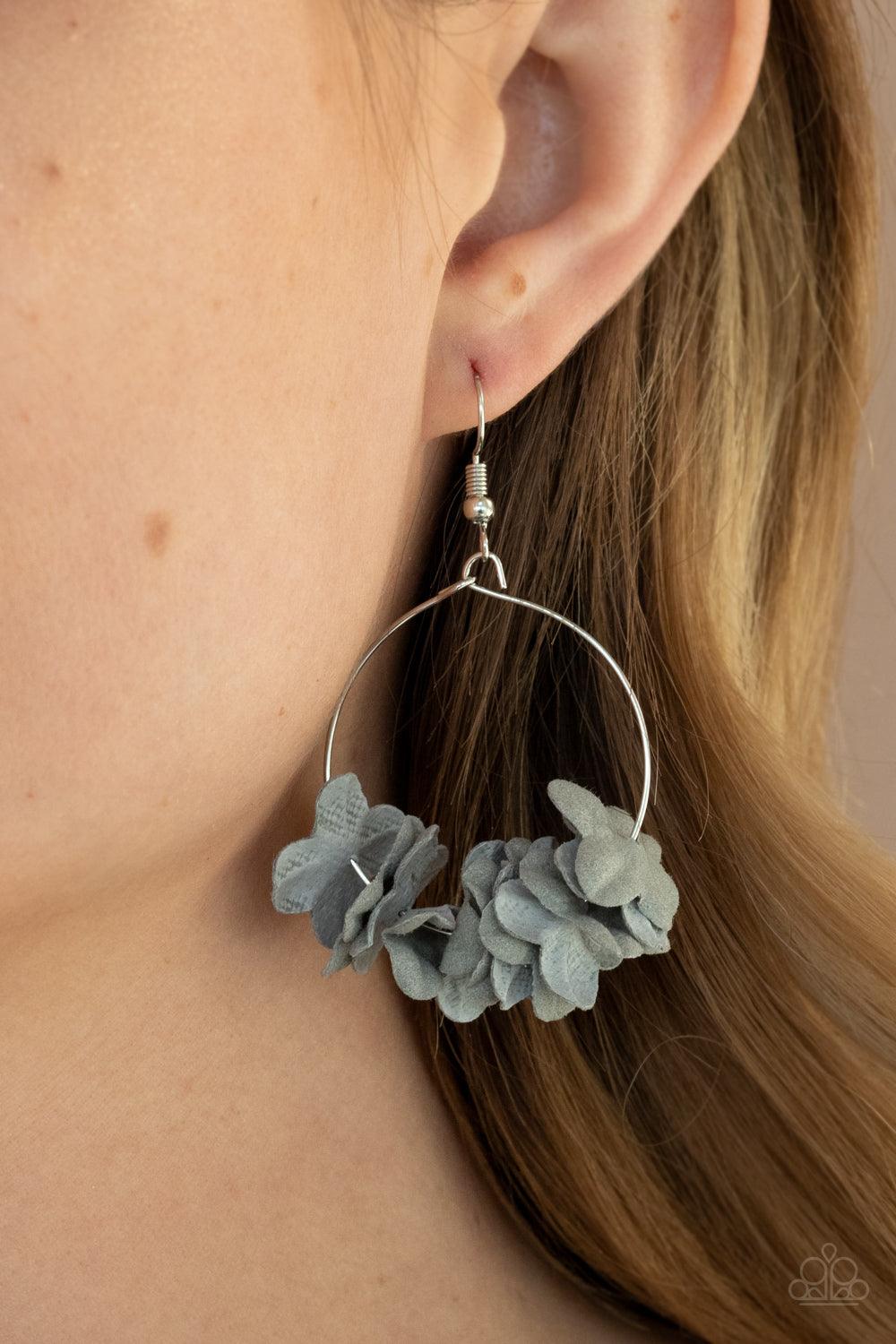 Paparazzi Accessories Flirty Florets - Silver A collection of gray paper-like flowers are threaded along a dainty silver hoop, creating a flirtatious floral fringe. Earring attaches to a standard fishhook fitting. Sold as one pair of earrings. Jewelry