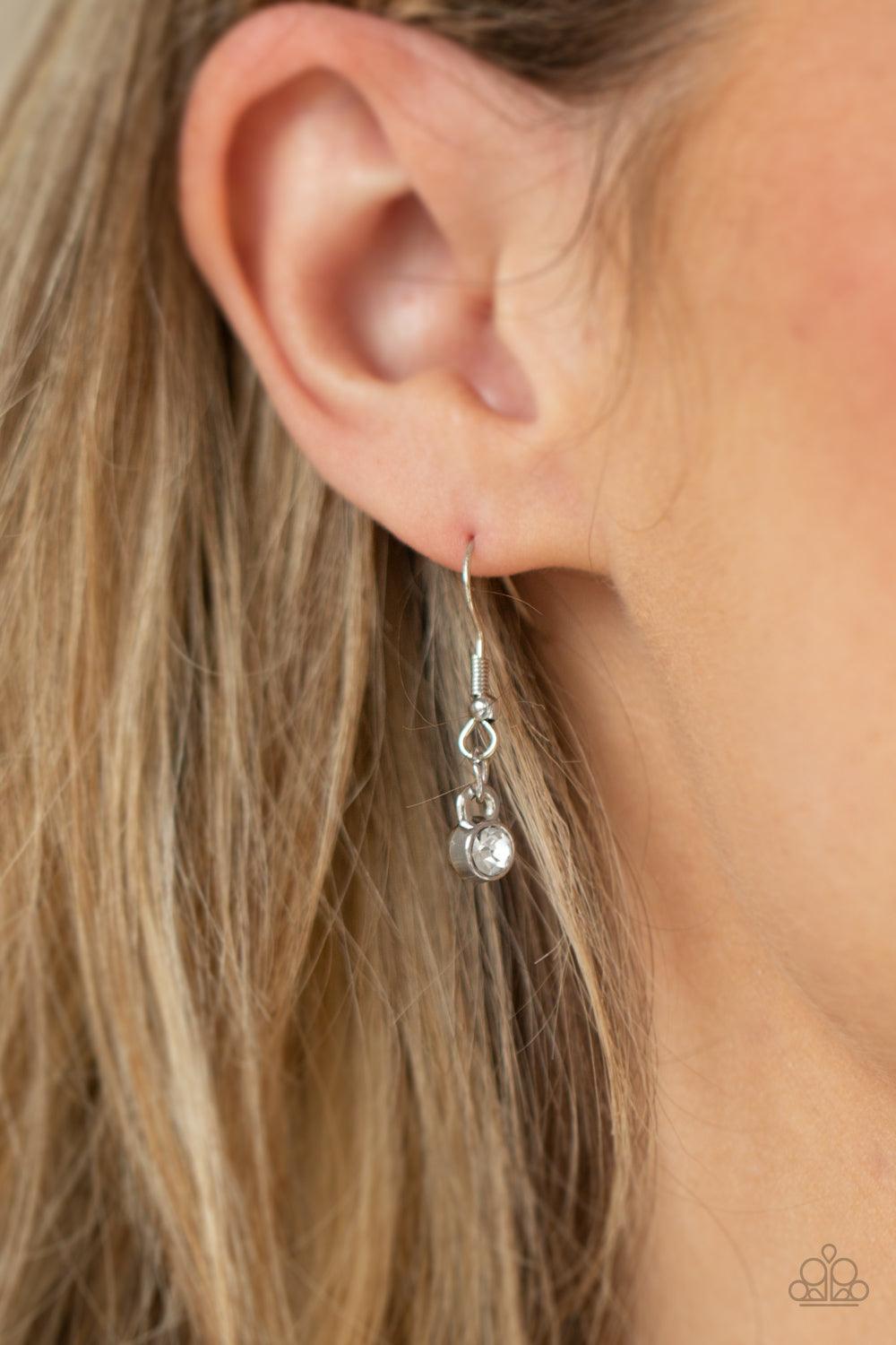 Paparazzi Accessories BLING to Attention - Brown A timeless array of round and marquise-cut white and golden topaz rhinestones delicately link into a collection of sparkly clusters, creating a scattered shimmer below the collar. Features an adjustable cla