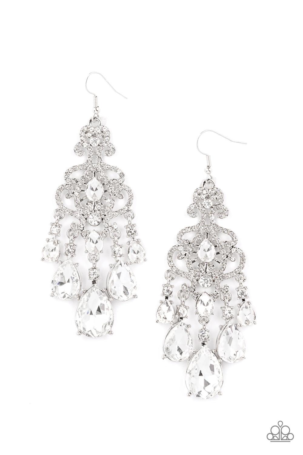 Paparazzi Accessories Queen Of All Things Sparkly - White Gradually increasing in size, glassy white teardrop gems create a dramatic fringe at the bottom of a decorative silver frame swirling with dainty white rhinestones for a timelessly over-the-top spa