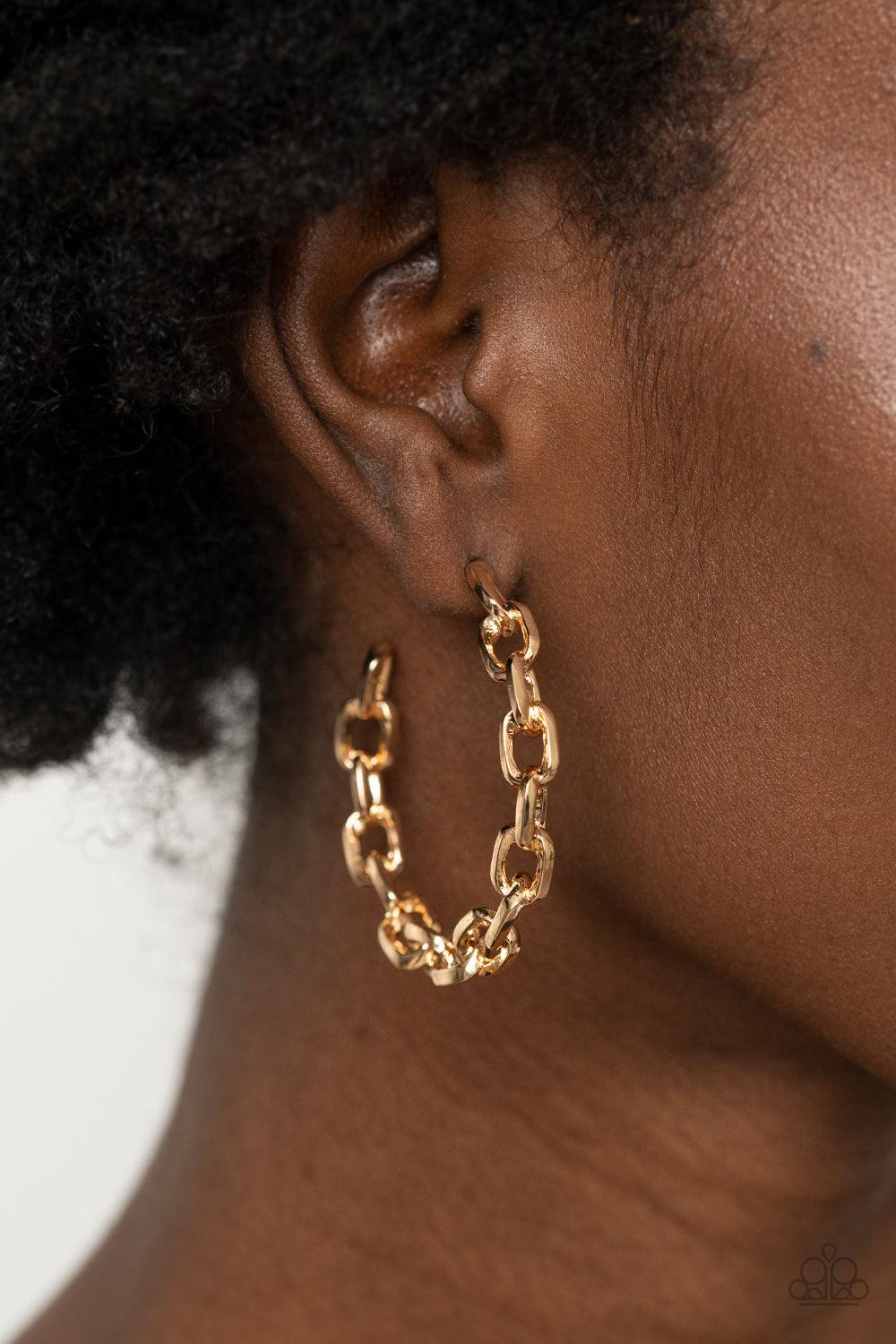 Paparazzi Accessories Stronger Together - Gold An immovable row of gold chain delicately twists into an edgy hoop for an intense industrial vibe. Earring attaches to a standard post fitting. Hoop measures approximately 1 3/4" in diameter. Sold as one pair