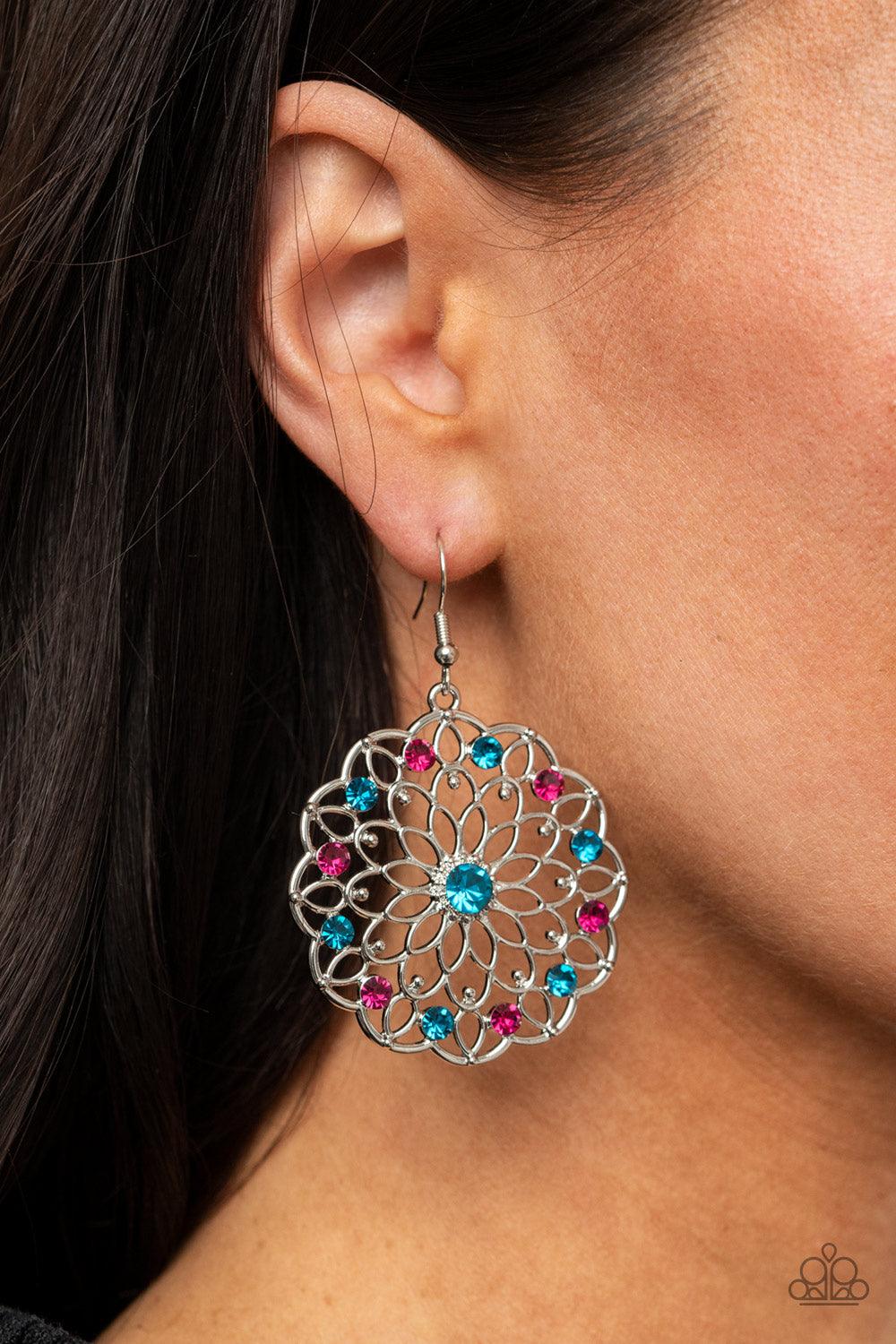 Paparazzi Accessories Posy Proposal - Multi Sparkly blue and pink rhinestones dot shimmery silver petals that fan out into a colorful blossom, creating a glittery floral frame. Earring attaches to a standard fishhook fitting. Sold as one pair of earrings.