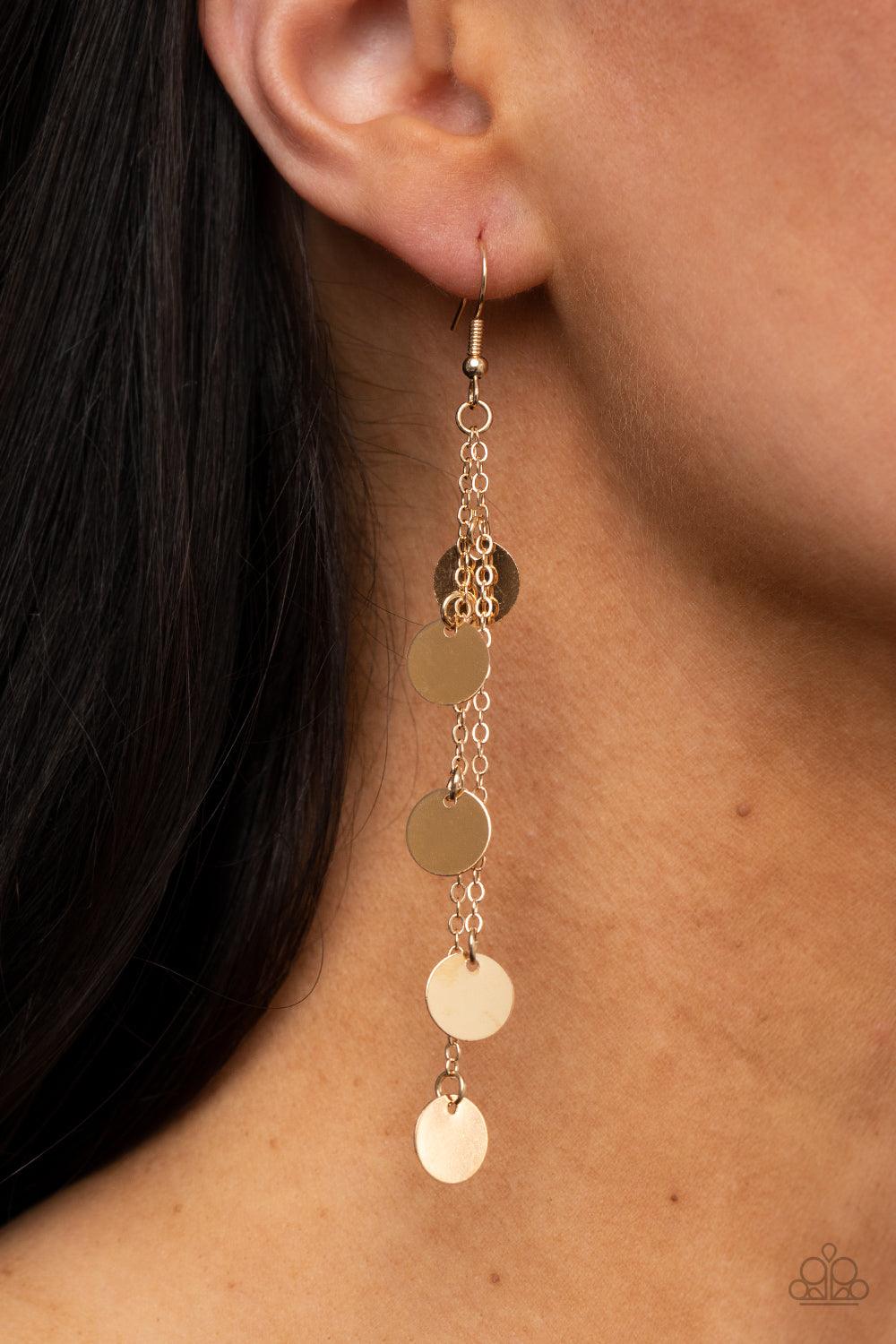 Paparazzi Accessories Take A Good Look - Gold Dainty gold discs haphazardly swing from two dainty gold chains, coalescing into a noisemaking shimmer. Earring attaches to a standard fishhook fitting. Sold as one pair of earrings. Earrings