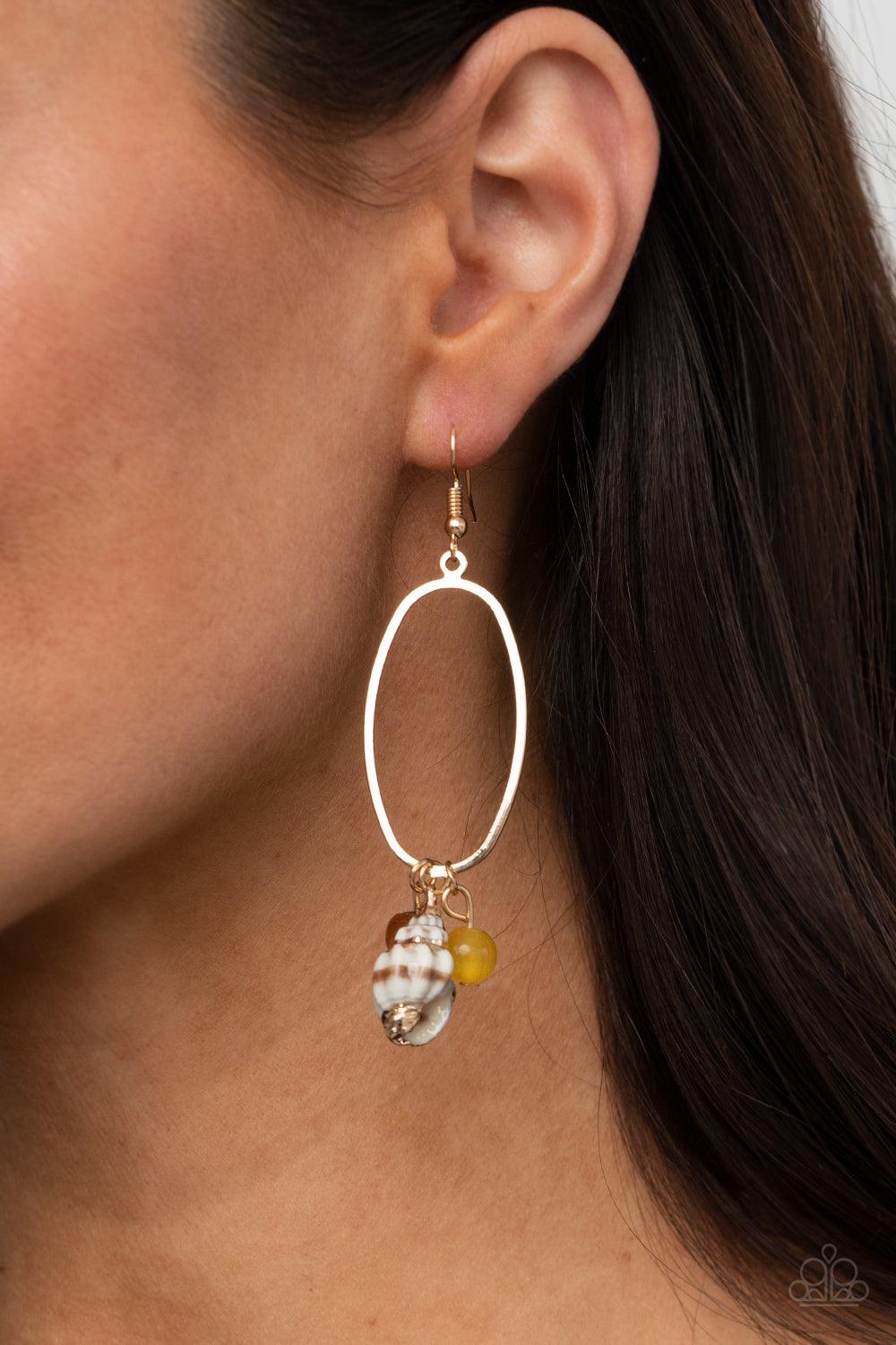 Paparazzi Accessories Golden Grotto - Yellow A gilded seashell, earthy wooden bead, and glassy yellow stone bead glide along the bottom of a glistening gold oval, creating a refined beach inspired fringe. Earring attaches to a standard fishhook fitting. S