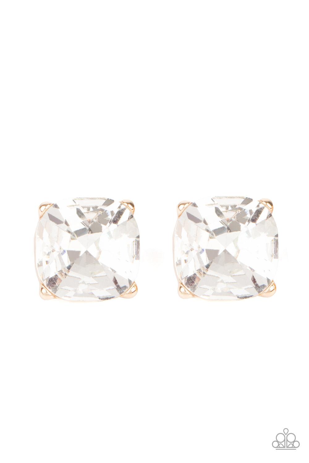 Paparazzi Accessories Royalty High - Gold A dramatically oversized white gem is nestled atop a pronged gold frame, creating a jaw-dropping dazzle. Earring attaches to a standard post fitting. Sold as one pair of post earrings. Jewelry