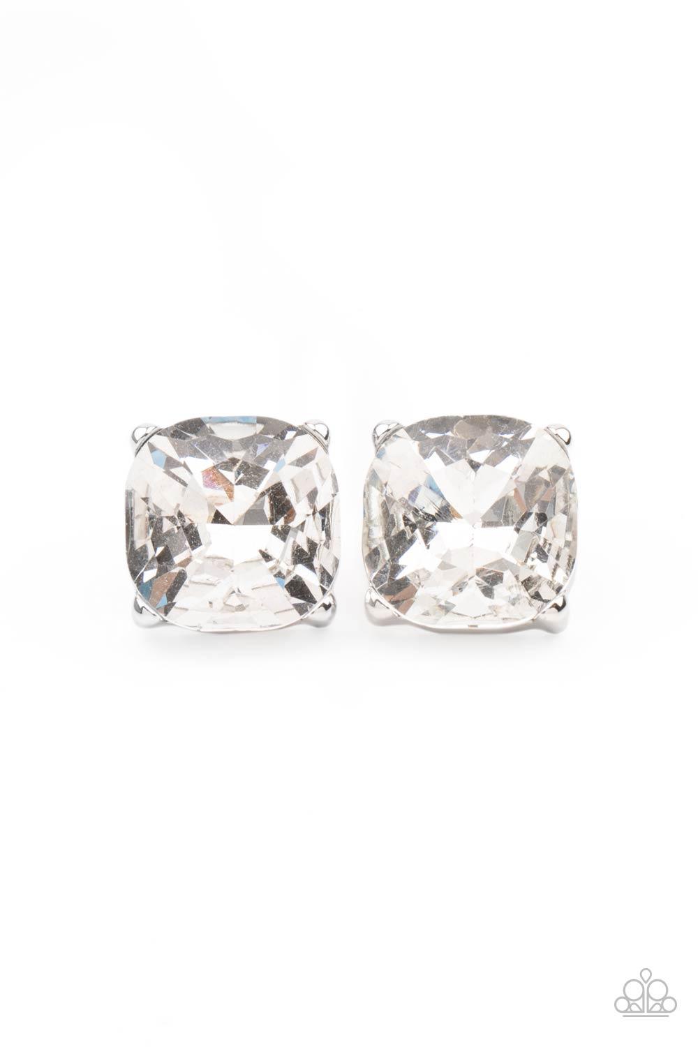 Paparazzi Accessories Royalty High - White A dramatically oversized white gem is nestled atop a pronged silver frame, creating a jaw-dropping dazzle. Earring attaches to a standard post fitting. Sold as one pair of post earrings. Jewelry