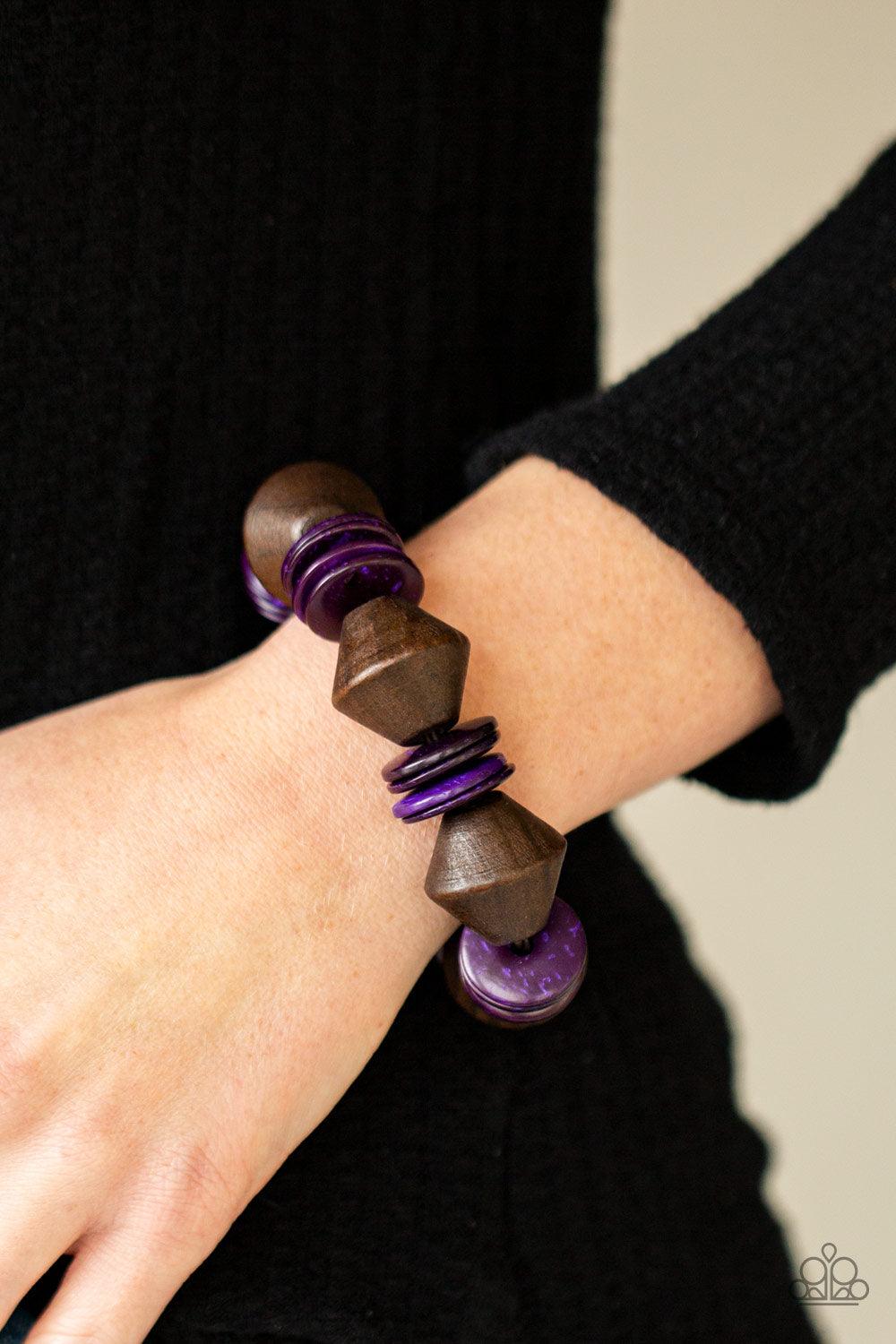 Paparazzi Accessories Bermuda Boardwalk - Purple Purple wooden discs and chunky brown wooden beads are threaded along a stretchy band around the wrist, creating a summery look. Sold as one individual bracelet. Jewelry