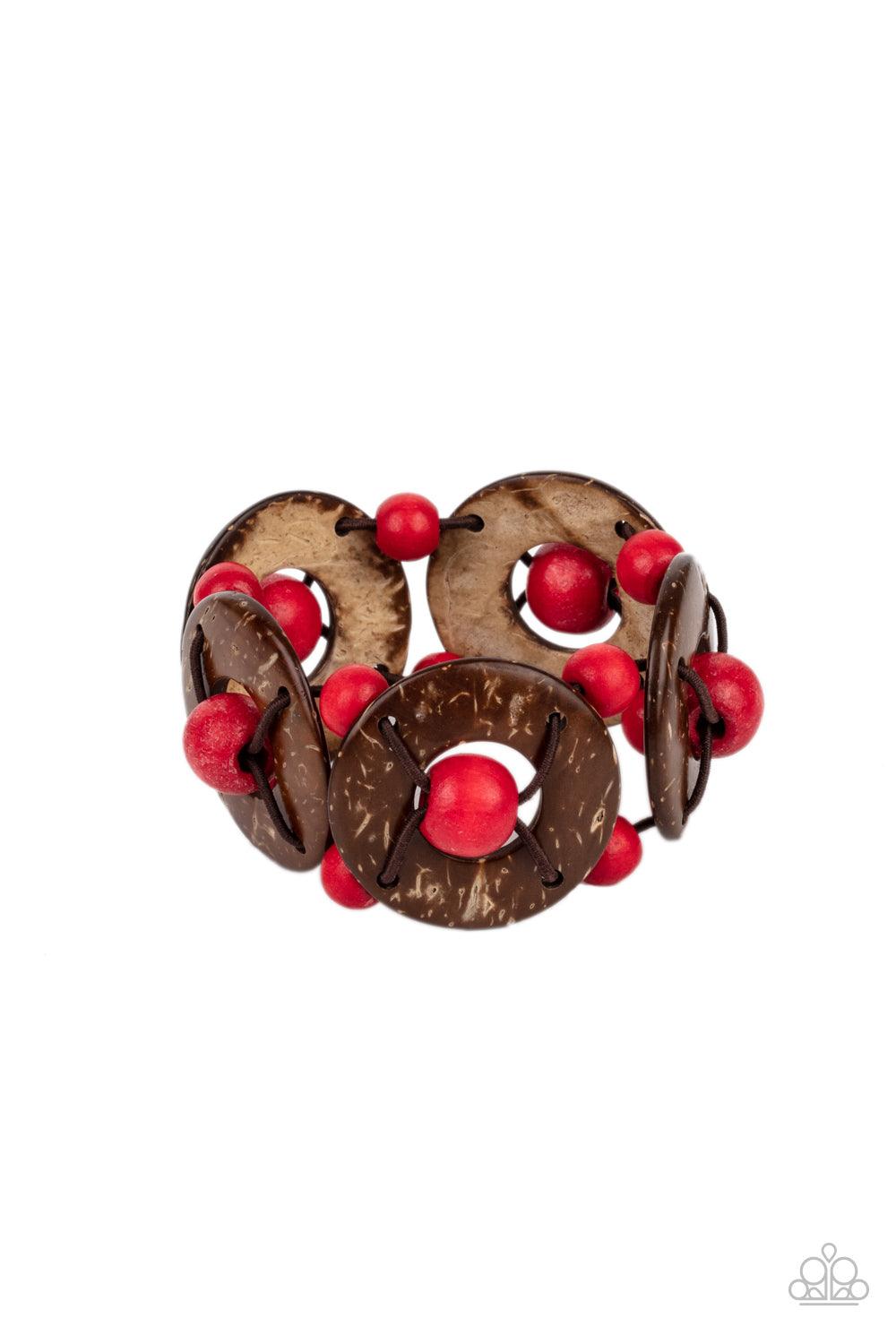 Paparazzi Accessories Island Adventure - Red An oversized collection of red wooden beads and distressed brown wooden discs are threaded along stretchy bands that decoratively weave around the wrist for a summery flair. Sold as one individual bracelet. Jew
