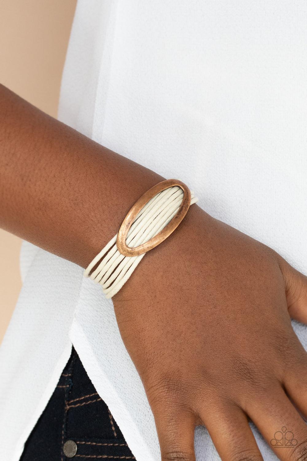 Paparazzi Accessories Corded Couture - White An oval copper fitting glides along strands of rustic white cording, creating colorful layers around the wrist. Features a magnetic closure. Sold as one individual bracelet. Jewelry