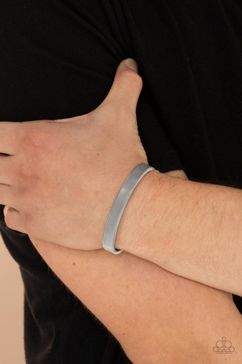 Paparazzi Accessories Quit MESHing around - Silver Featuring a mesh-like finish, a tactile silver cuff curls around the wrist for a rustic flair. Sold as one individual bracelet. Jewelry