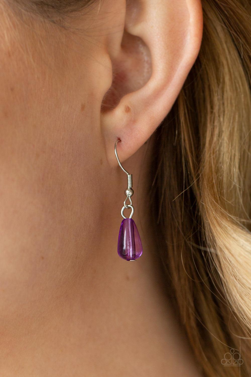 Paparazzi Accessories Midsummer Mixer - Purple Varying in opacity, a vivacious collection of purple oval and teardrop acrylic and crystal-like beads cascade from two bold silver chains below the collar for a flirtatiously layered look. Features an adjusta