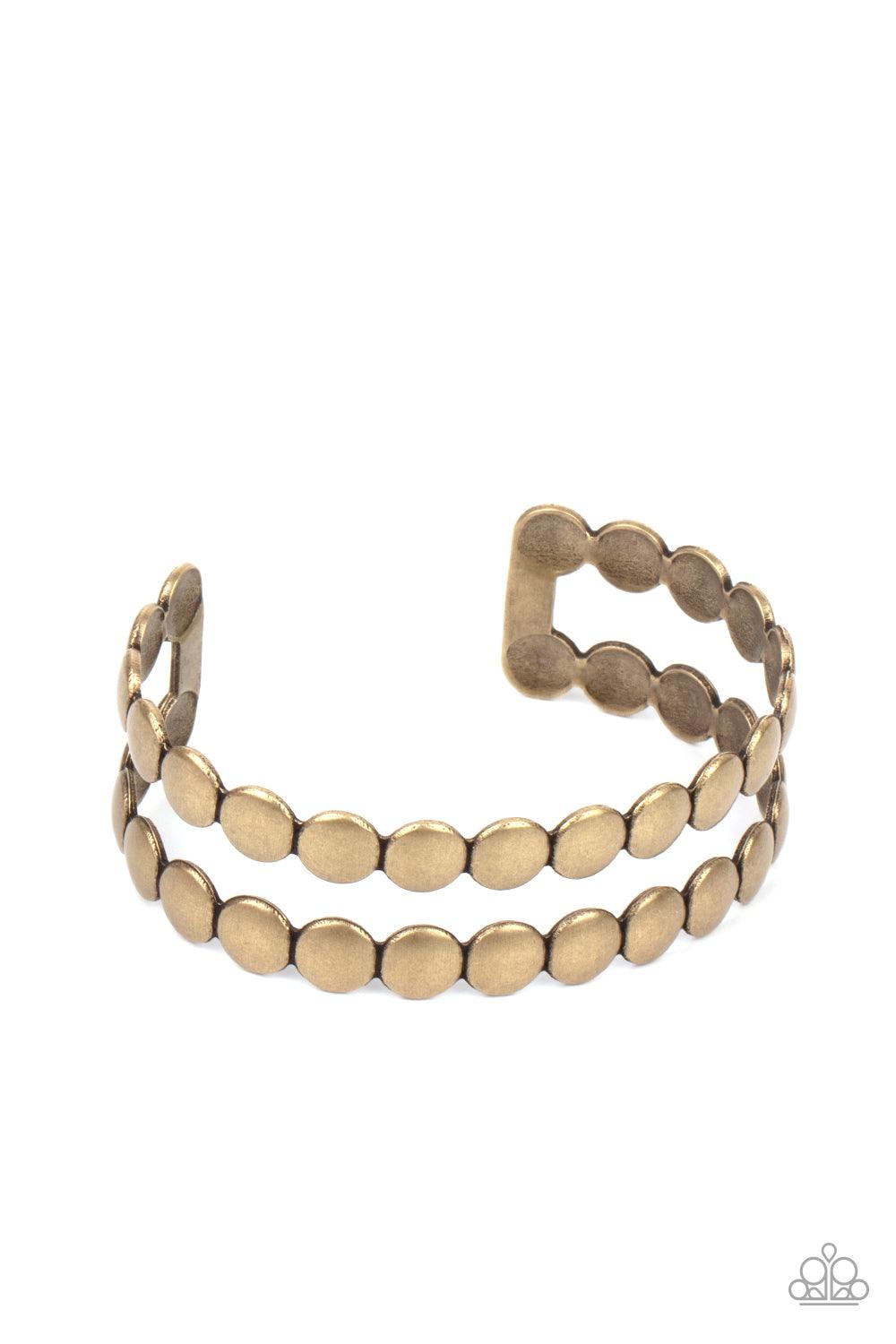 Paparazzi Accessories On The Spot Shimmer - Brass Brushed in an antiqued finish, rows of flattened brass studs coalesce into a rustic cuff around the wrist. Sold as one individual bracelet. Jewelry