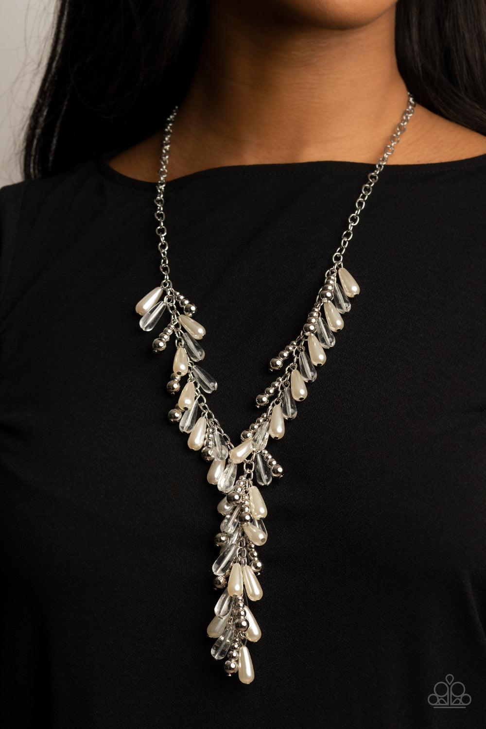 Paparazzi Accessories Dripping With DIVA-ttitude - White Glassy, pearly, and silver beaded teardrops elegantly drip along a classic silver chain across the chest. Matching beads cascade from an extended tassel, creating a glamorously clustered pendant. Fe