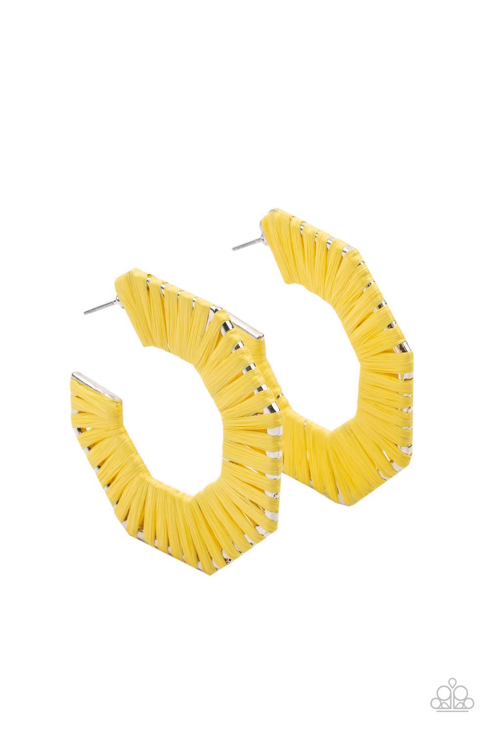 Paparazzi Accessories Fabulously Fiesta - Yellow Illuminating wicker-like cording is wrapped around a hexagonal hoop, creating a colorful pop of color. Earring attaches to a standard post fitting. Hoop measures approximately 2" in diameter. Sold as one pa