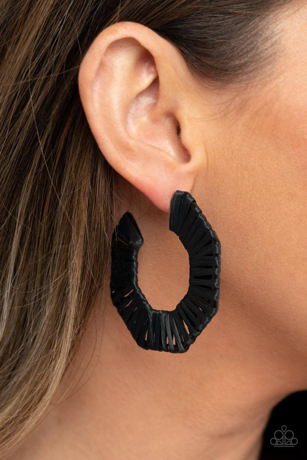Paparazzi Accessories Fabulously Fiesta - Black Black wicker-like cording is wrapped around a hexagonal hoop, creating a bold pop of color. Earring attaches to a standard post fitting. Hoop measures approximately 2" in diameter. Sold as one pair of hoop e