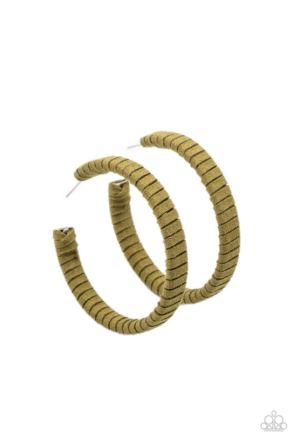 Paparazzi Accessories Suede Parade - Green Green suede cording wraps around an oversized hoop, creating an earthy pop of color. Earring attaches to a standard post fitting. Hoop measures approximately 2 1/4" in diameter. Sold as one pair of hoop earrings.