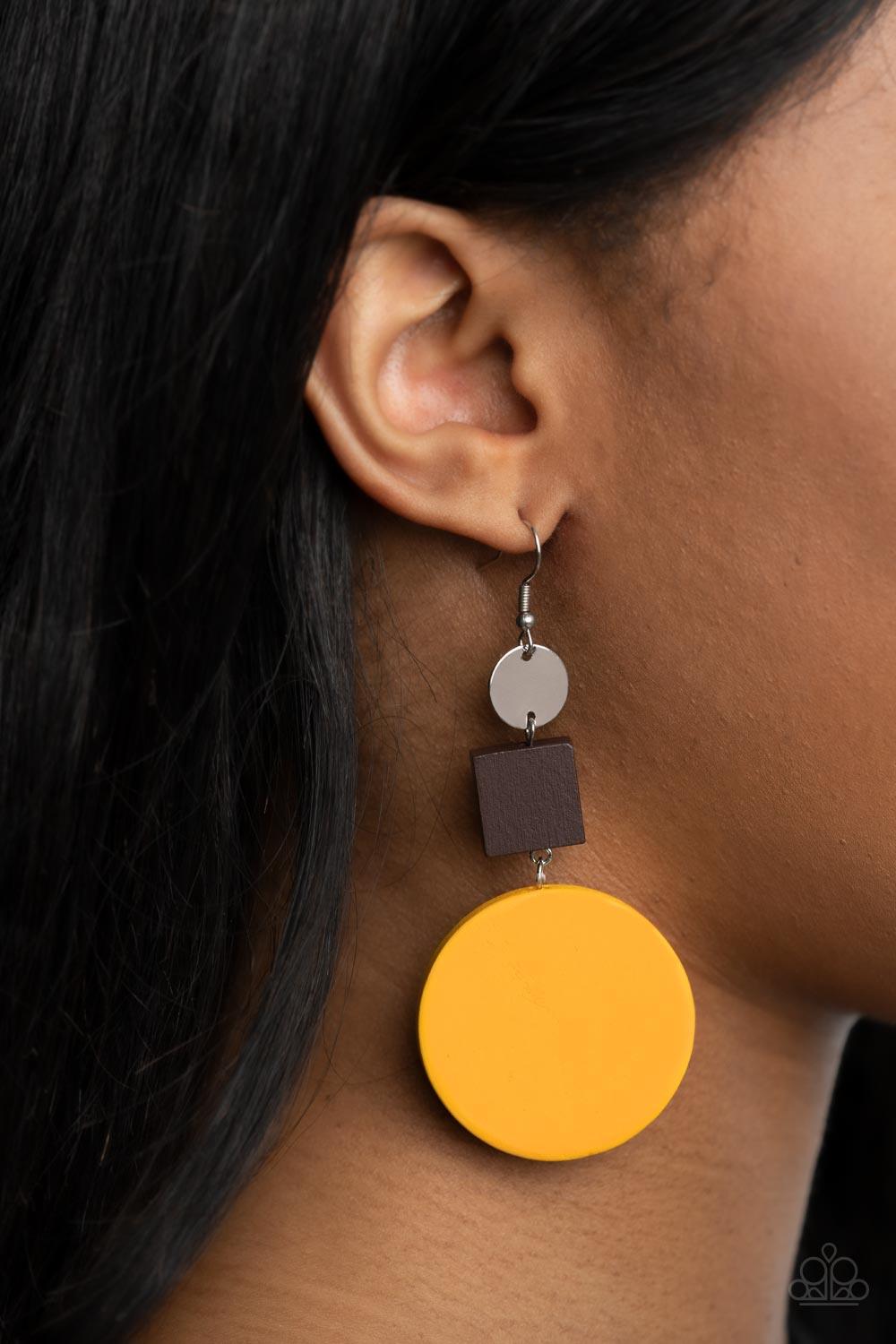 Paparazzi Accessories Modern Materials - Yellow A shiny silver disc, brown wooden square, and oversized yellow wooden circle delicately link into a colorfully retro lure for a trendsetting finish. Earring attaches to a standard fishhook fitting. Sold as o