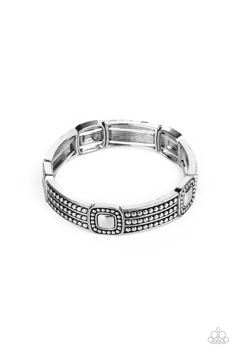 Paparazzi Accessories Rustic Redux - Silver Featuring silver studded patterns, square and rectangular frames are threaded along stretchy bands around the wrist for a rustic flair. Sold as one individual bracelet. Jewelry
