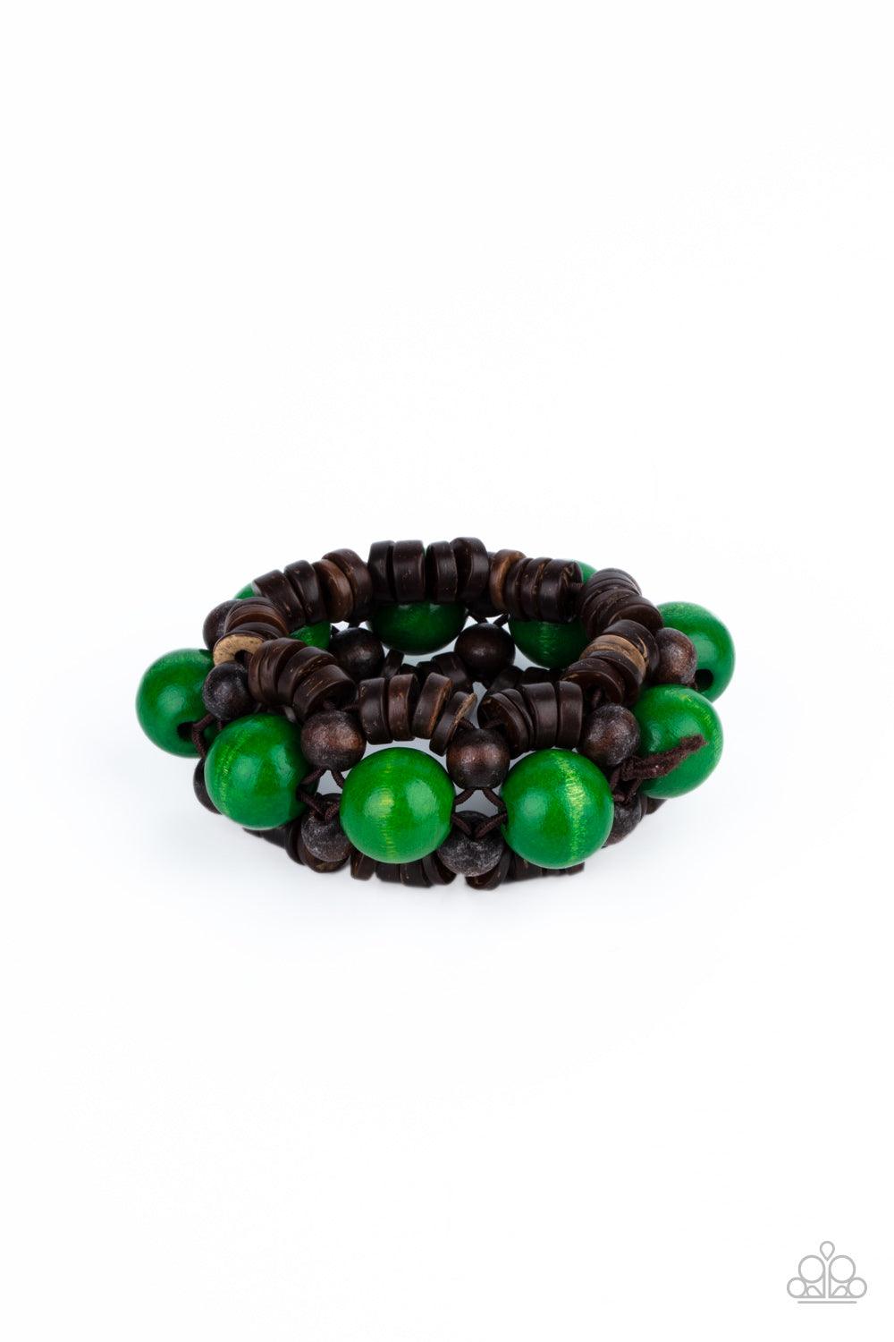 Paparazzi Accessories Tropical Temptations - Green Oversized green wooden beads, rustic brown wooden beads, and dainty wooden discs are ornately threaded along braided stretchy bands around the wrist, creating a summery centerpiece. Sold as one individual