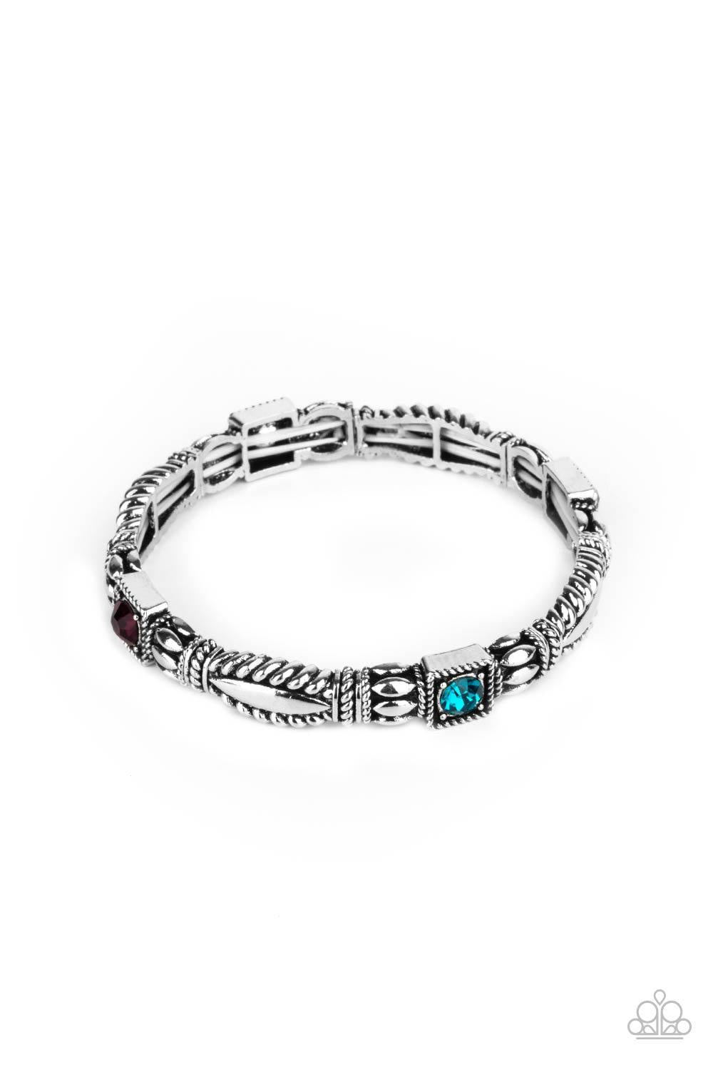 Paparazzi Accessories Get This GLOW On The Road - Multi Dotted with green, purple, blue, and pink rhinestone centers, decorative silver frames are threaded along stretchy bands around the wrist, creating a colorful display. Sold as one individual bracelet