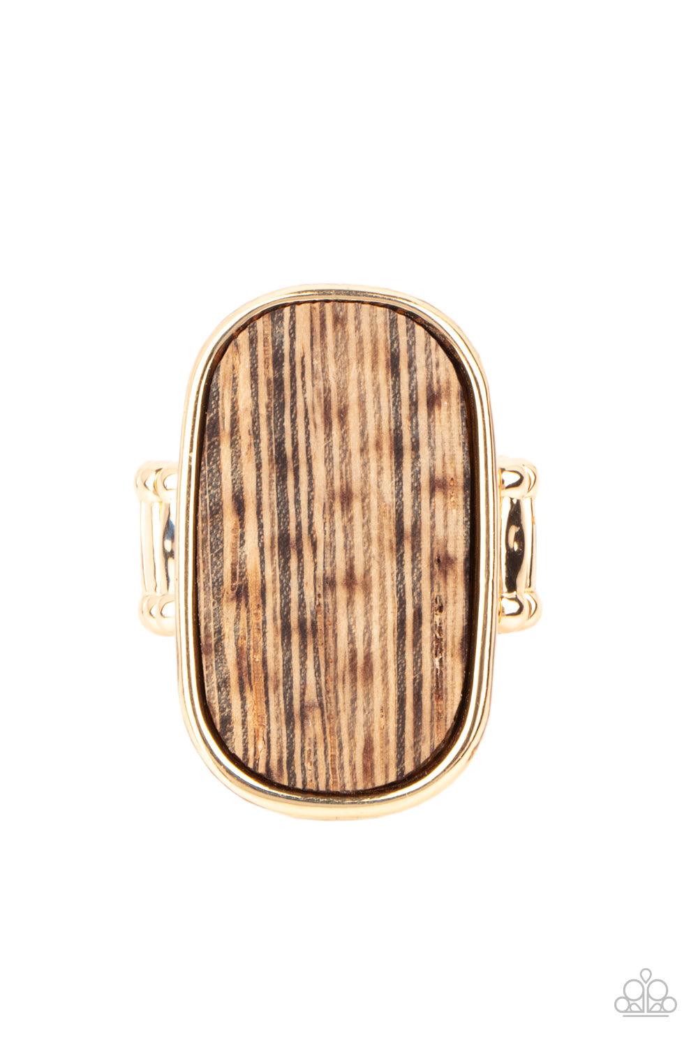 Paparazzi Accessories Reclaimed Refinement - Gold Encased in a sleek gold frame, a rustic piece of wood sits atop the finger for an unexpected refinement. Features a stretchy band for a flexible fit. Sold as one individual ring. Jewelry