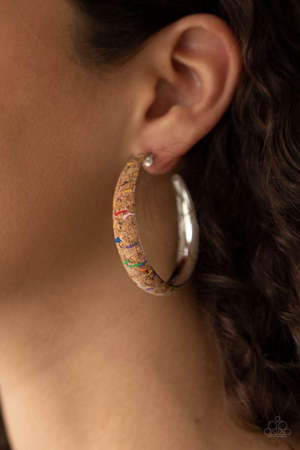 Paparazzi Accessories A CORK In The Road - Multi A cork lined silver hoop is splattered in multicolored paint, creating a colorful display. Hoop measures approximately 2" in diameter. Earring attaches to a standard post fitting. Sold as one pair of hoop e