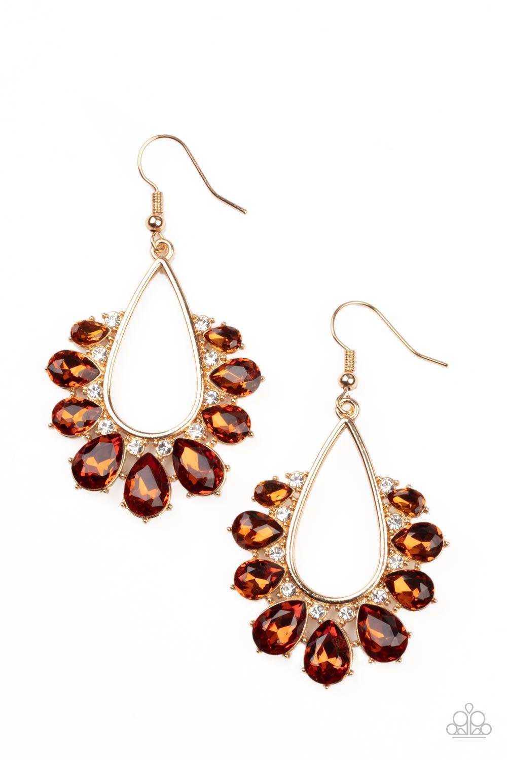 Paparazzi Accessories Two Can Play That Game - Brown Gradually increasing in size, a glittery collection of topaz teardrop rhinestones fan out from a white rhinestone dotted gold teardrop frame, creating a sparkly statement. Earring attaches to a standard