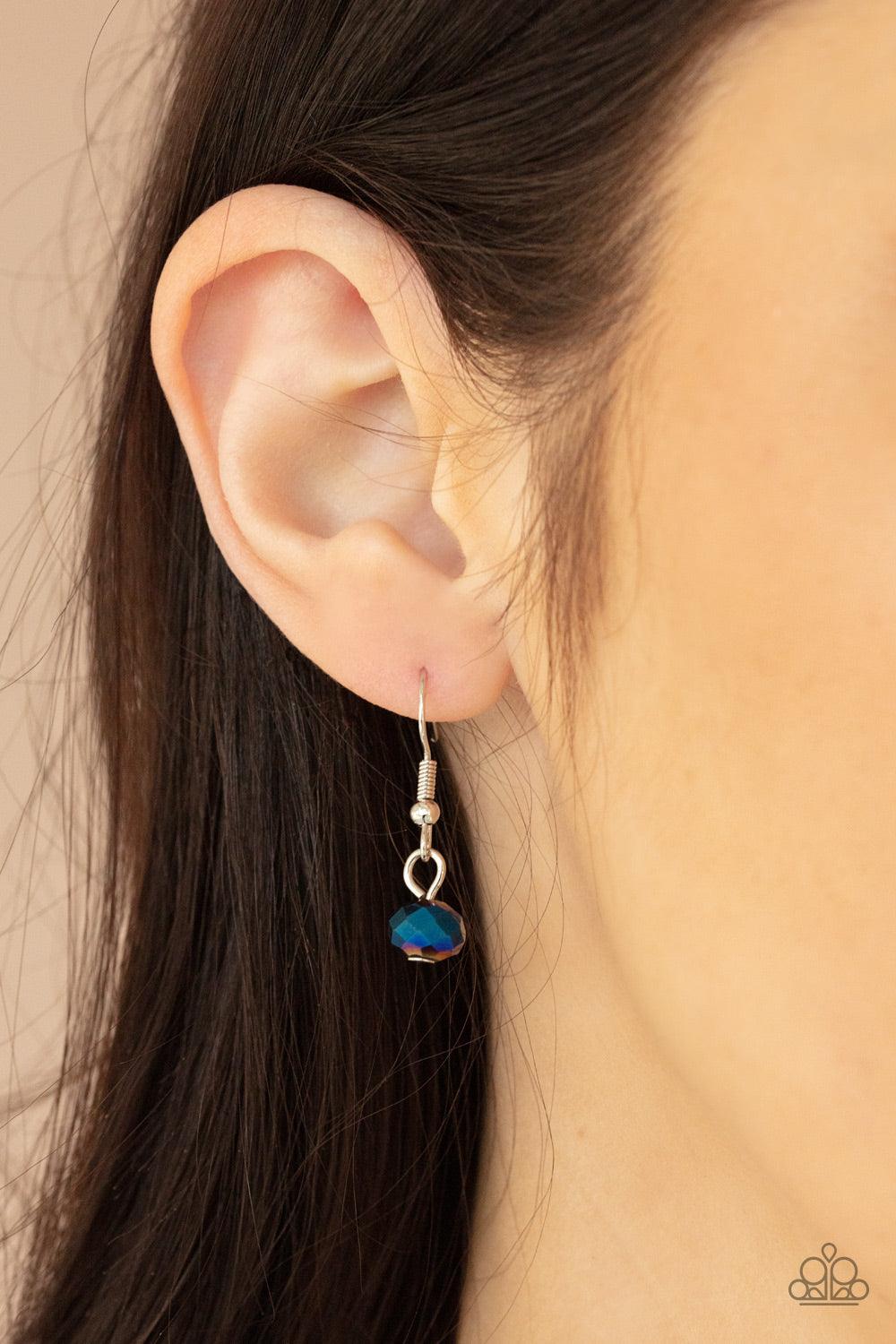 Paparazzi Accessories Cosmic Real Estate - Blue Featuring an oil spill finish, metallic blue beads and faceted crystal-like accents are fitted in place along dainty wires, creating the illusion of floating layers below the collar. Dainty silver beads and