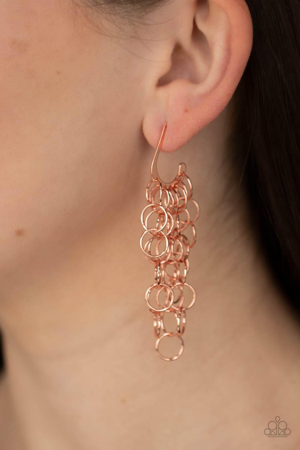 Paparazzi Accessories Long Live The Rebels - Copper Strands of shiny copper links cascade from the bottom of a dainty hook shaped hoop, creating a rebellious fringe. Hoop measures approximately 1/2" in diameter. Earring attaches to a standard post fitting