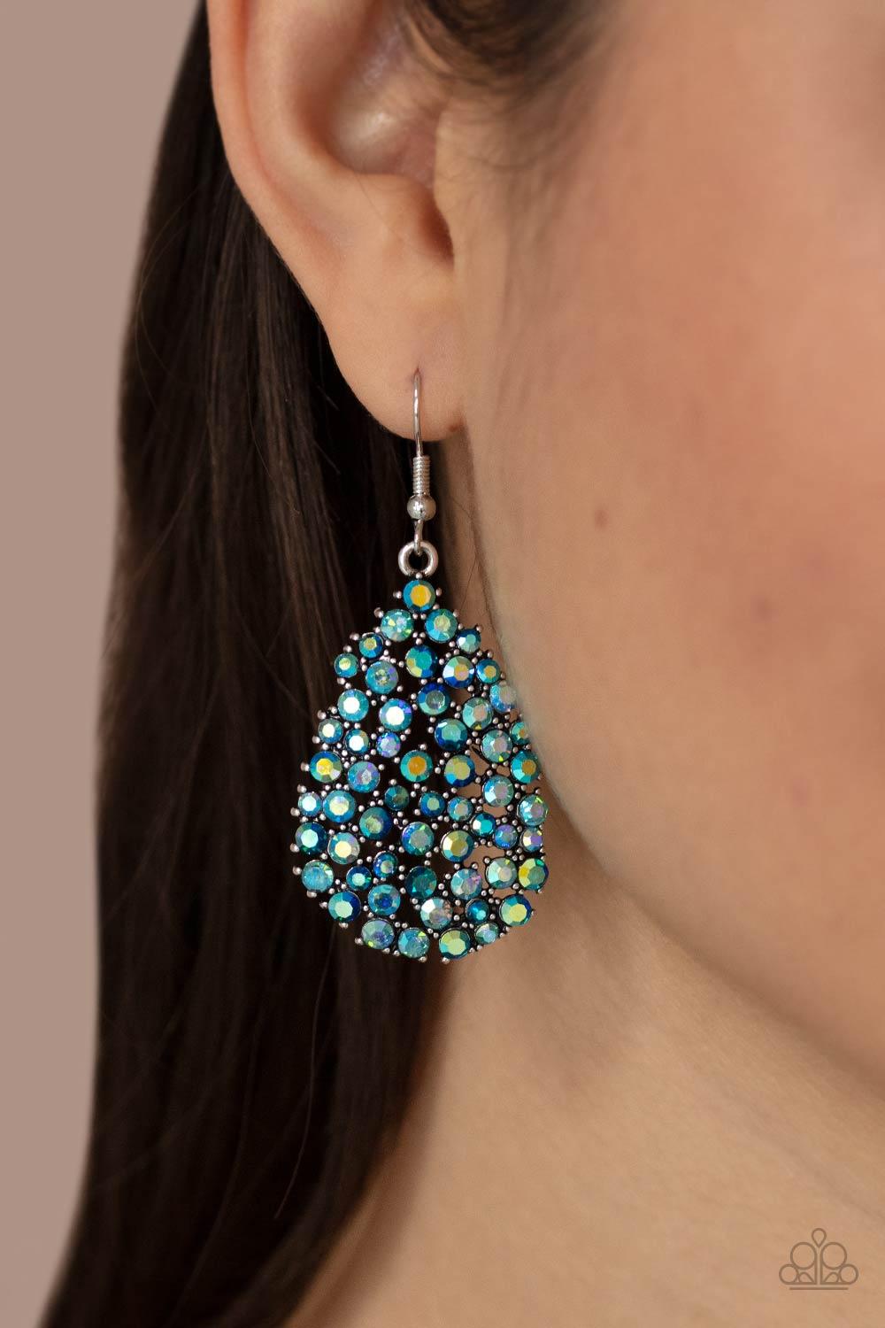 Paparazzi Accessories Daydreamy Dazzle - Multi Featuring studded silver fittings, a smoldering collection of iridescent rhinestones coalesce into a dazzling teardrop frame. Earring attaches to a standard fishhook fitting. Sold as one pair of earrings. Jew