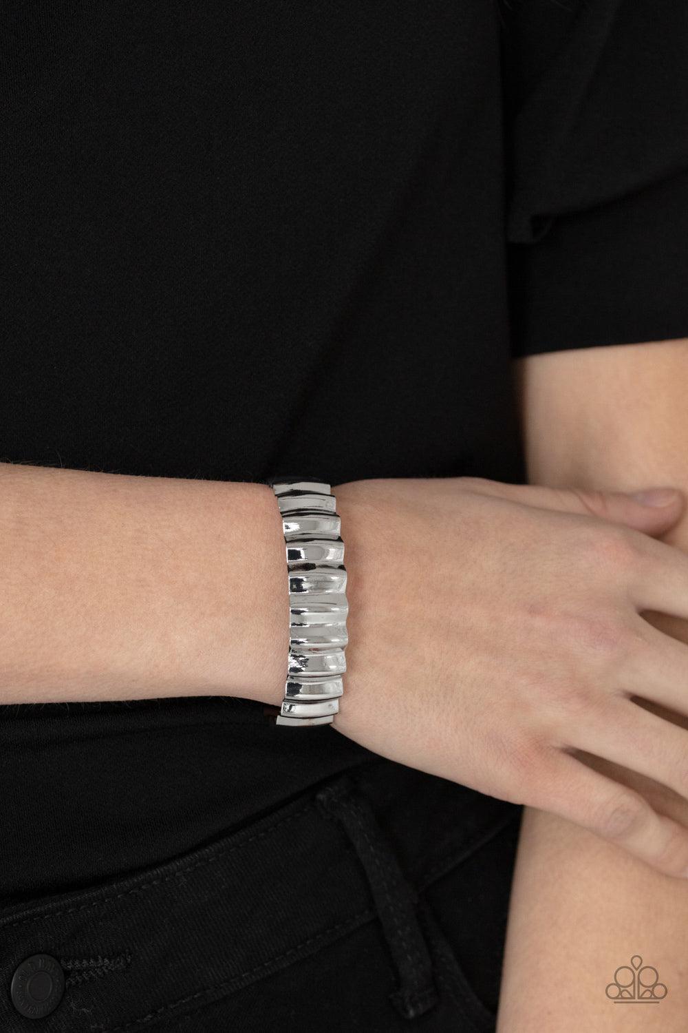 Paparazzi Accessories Across The HEIR-Waves - Silver Polished in a high sheen finish, a crinkled silver cuff delicately curls around the wrist for an intense industrial look. Sold as one individual bracelet. Bracelets