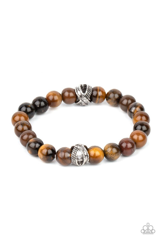 Paparazzi Accessories ZEN Commandments - Brown Infused with textured silver accents, an earthy collection of tiger's eye stones are threaded along a stretchy band around the wrist for a seasonal fashion. Sold as one individual bracelet. Jewelry