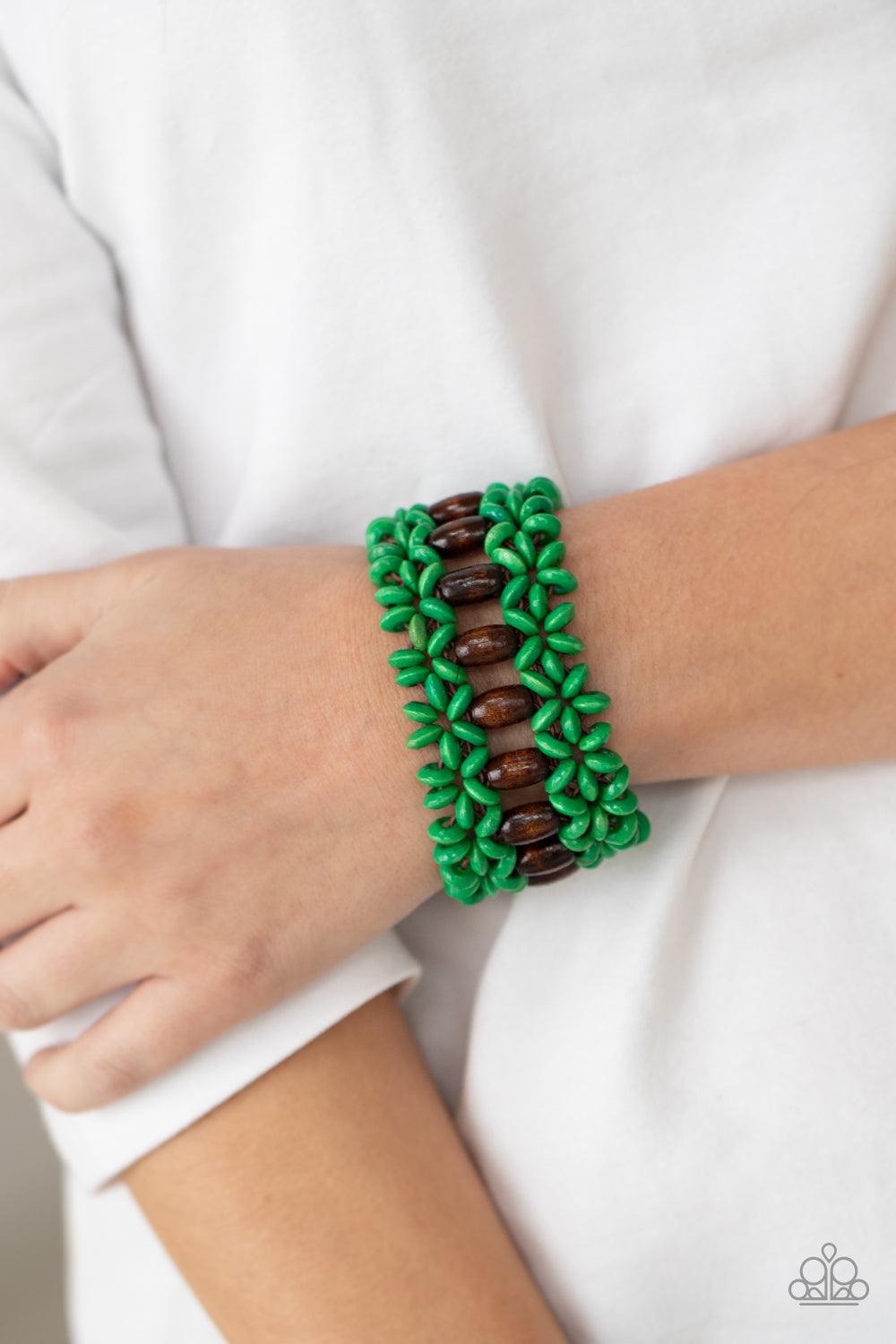 Paparazzi Accessories Bali Beach Retreat - Green Green wooden discs and brown wooden beads are threaded along braided stretchy bands around the wrist, creating a colorful tropical display. Sold as one individual bracelet. Bracelets