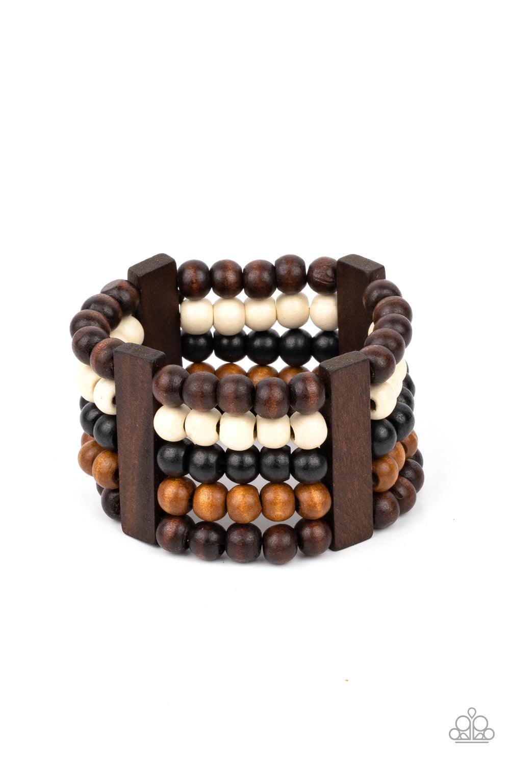 Paparazzi Accessories Caribbean Catwalk - Multi Held in place by rectangular wooden frames, strands of brown, black, and white wooden beads are threaded along stretchy bands around the wrist for a colorfully tropical look. Sold as one individual bracelet.