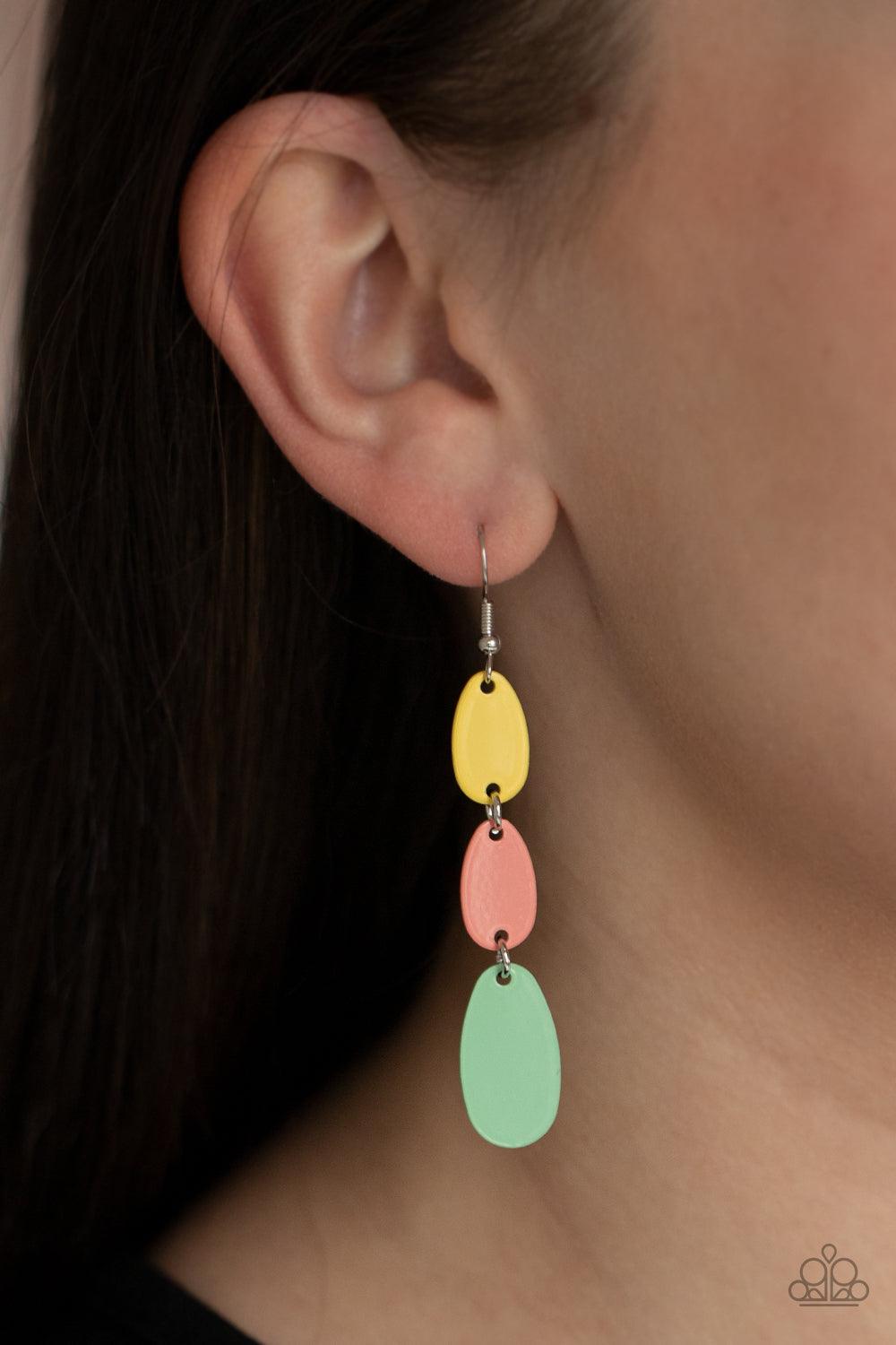 Paparazzi Accessories Rainbow Drops - Multi Painted in shiny Illuminating, Burnt Coral, and Green Ash finishes, lengthened oval frames drip from the ear, linking into a colorful lure. Earring attaches to a standard fishhook fitting. Sold as one pair of ea