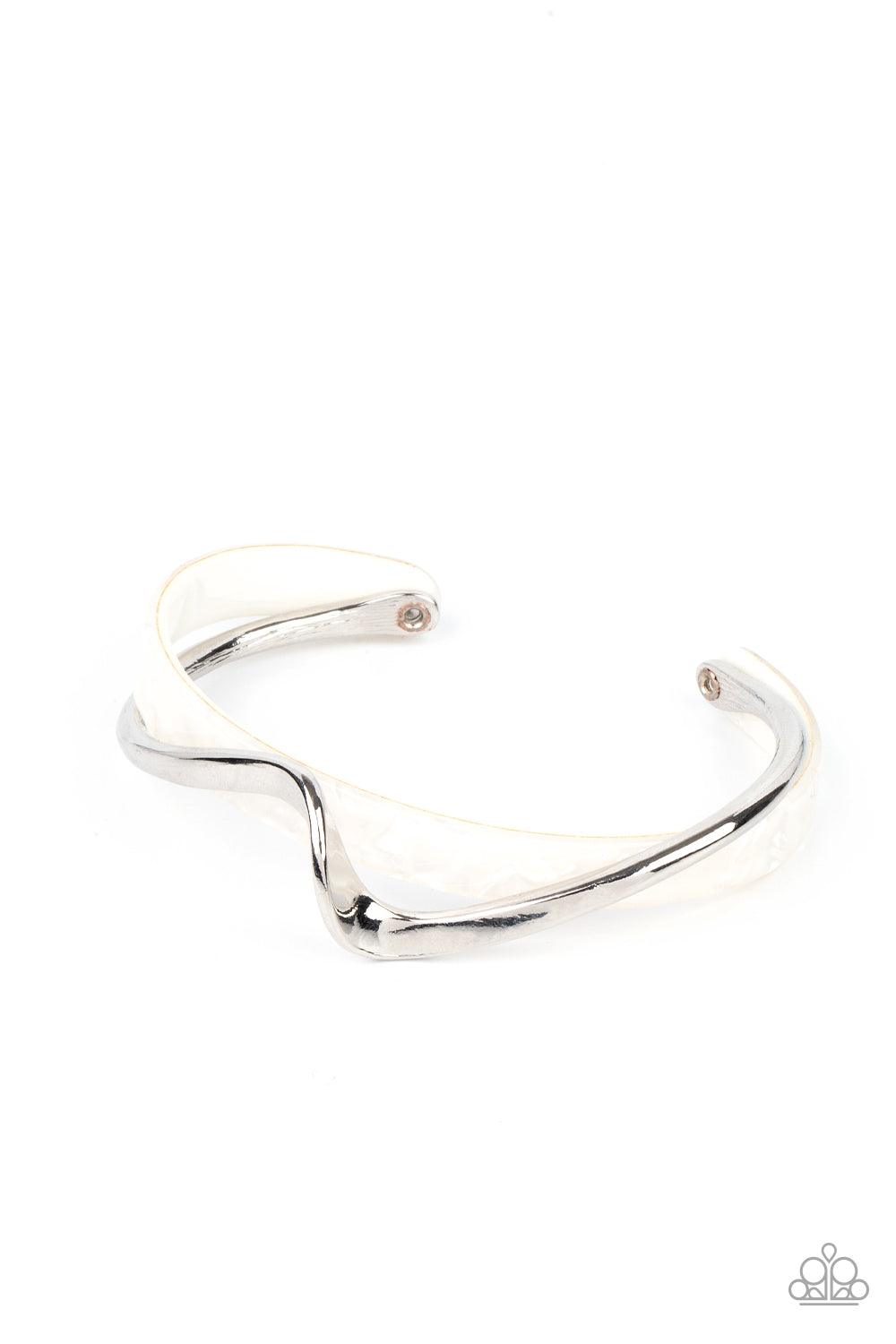 Paparazzi Accessories Craveable Curves - White A flat silver bar delicately curls across a dainty white shell-like acrylic cuff, creating a whimsical centerpiece around the wrist. Sold as one individual bracelet. Jewelry