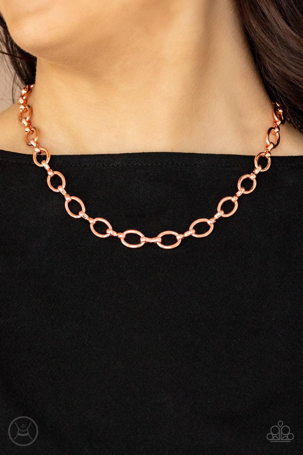 Paparazzi Accessories Craveable Couture - Copper A collection of oversized shiny copper ovals and shiny copper fittings interlock around the neck, creating an intense industrial look. Features an adjustable clasp closure. Sold as one individual choker nec